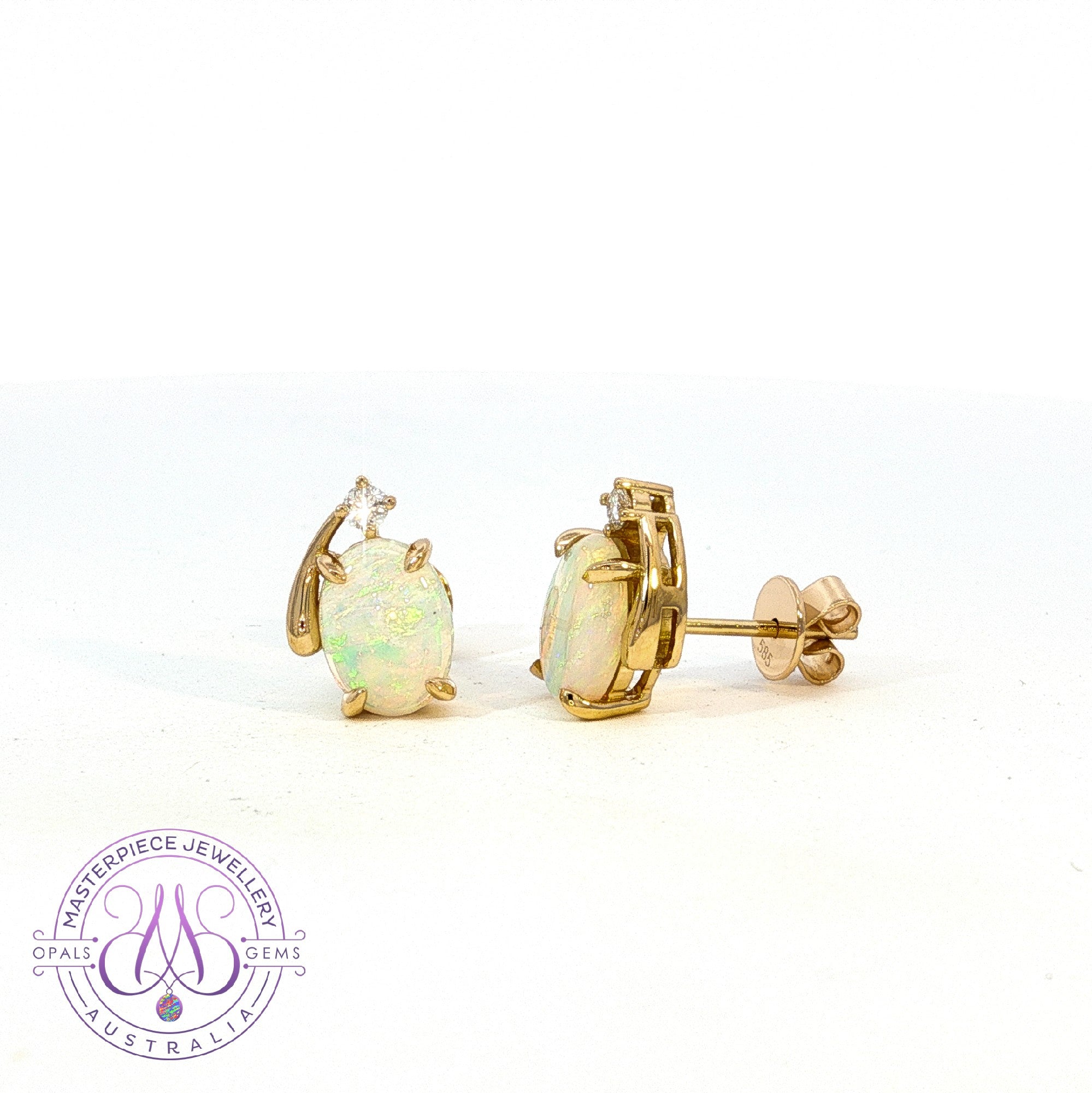 18kt Yellow Gold Crystal Opal 8x6mm and diamond studs