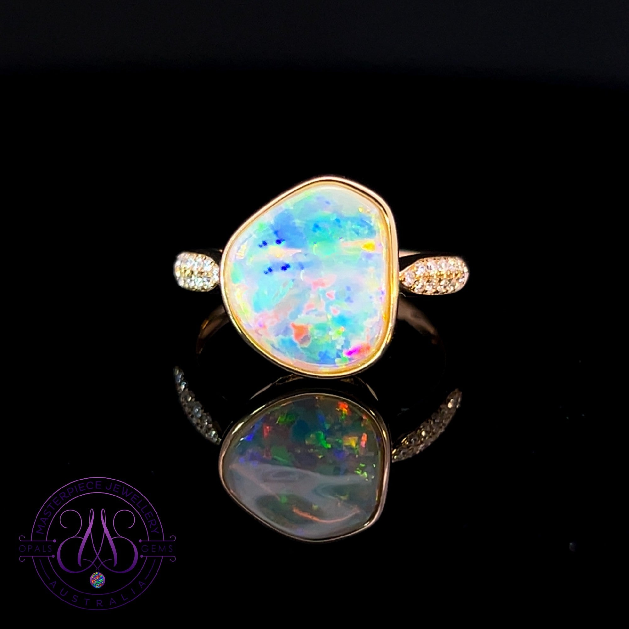 18kt Yellow Gold Crystal Opal 1.1ct and diamond ring