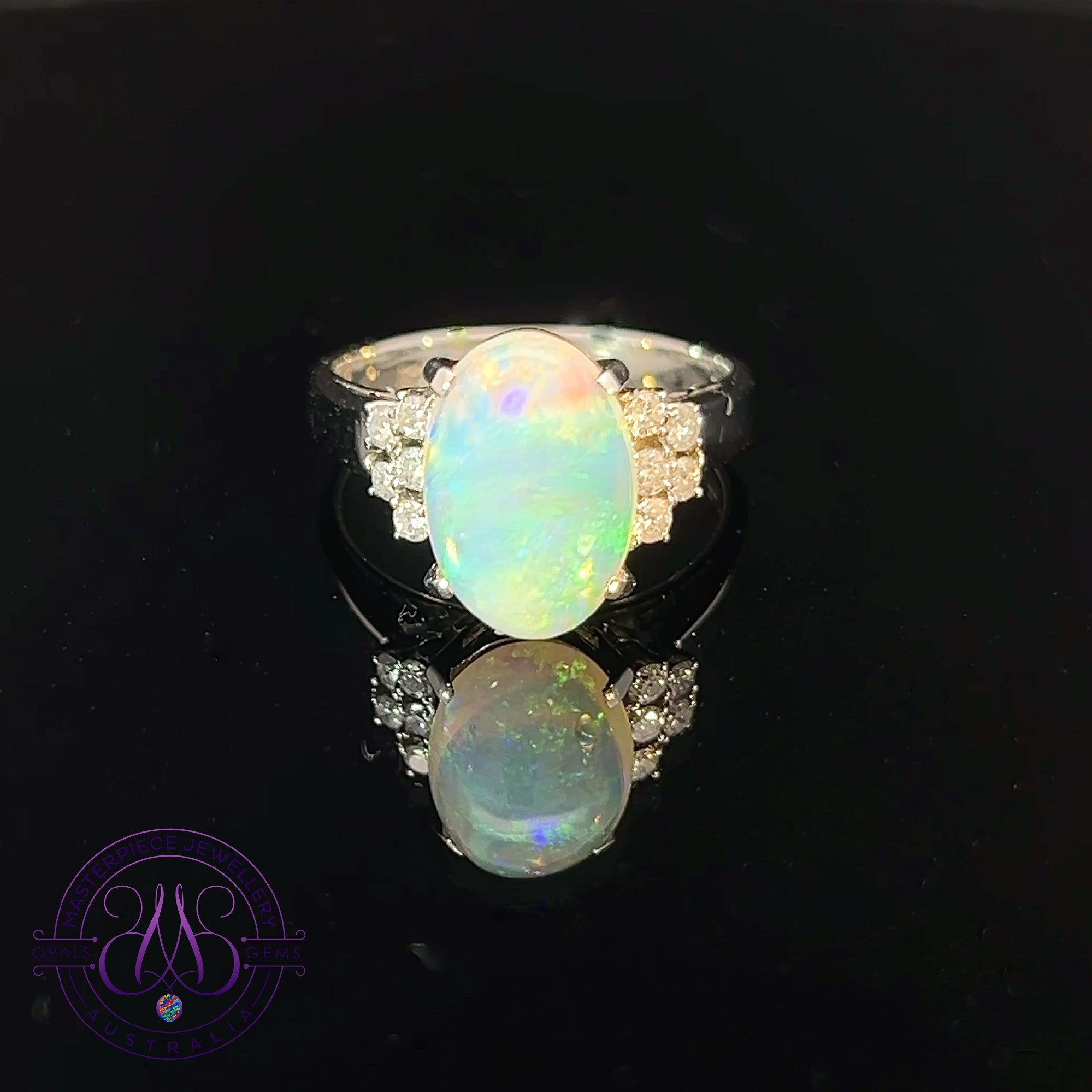 Platinum Crystal Opal 2.01ct and diamond ring