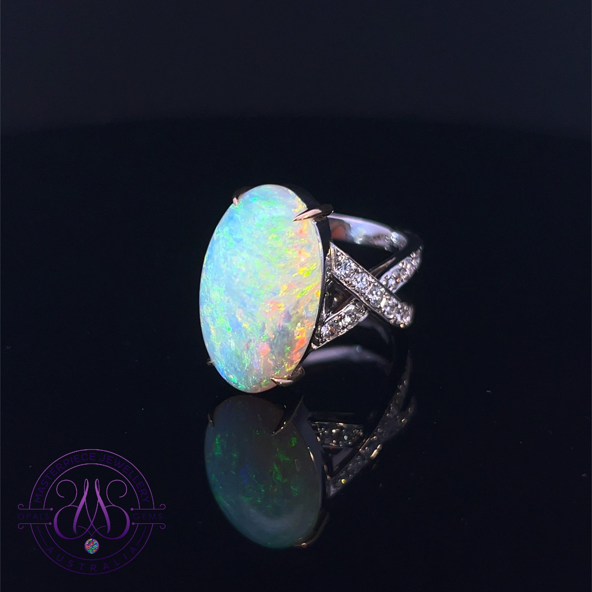 Platinum White Opal 9.2ct and diamond crossover ring