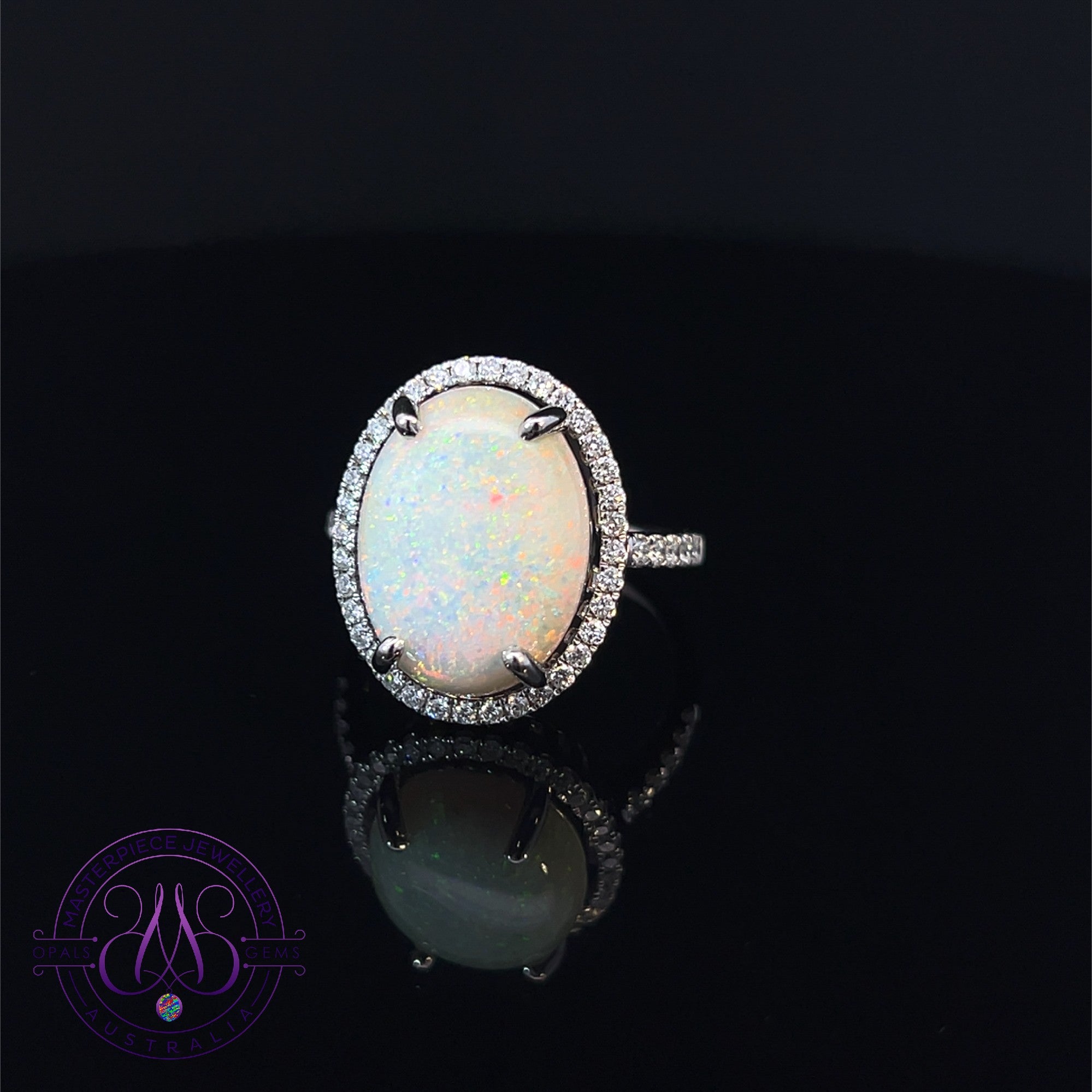 Platinum Halo White Opal 5.36ct and diamond cluster ring