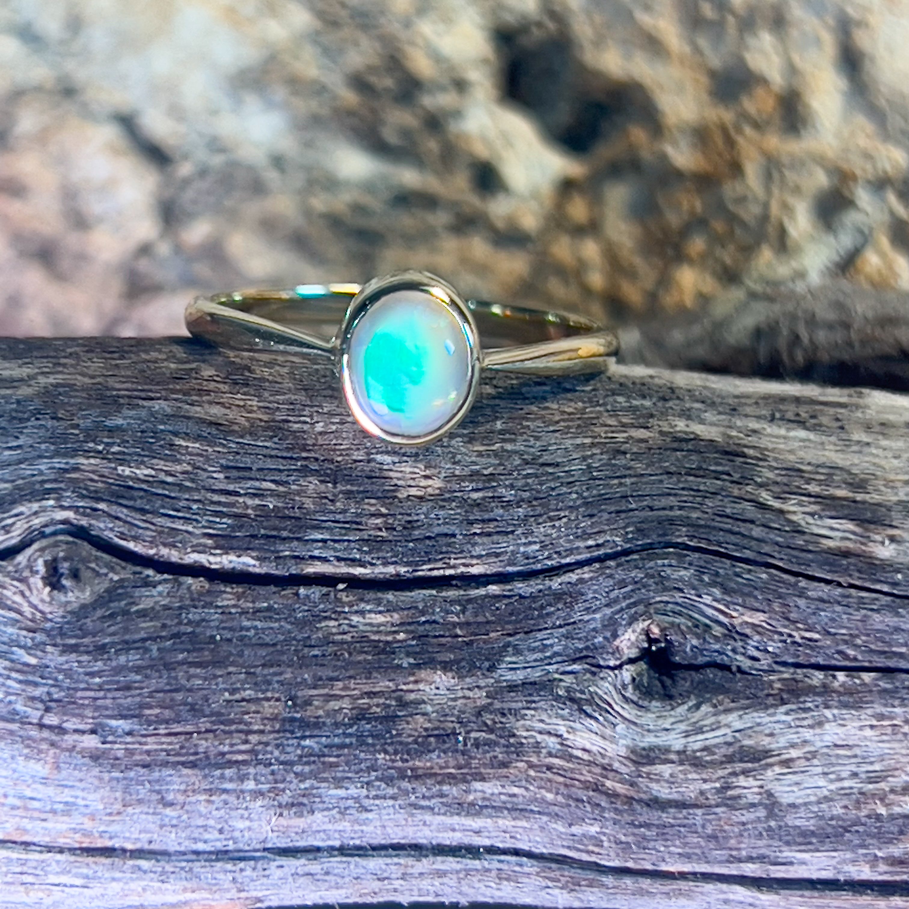 14kt Yellow Gold Black Opal 0.5ct bezel set solitaire ring - Masterpiece Jewellery Opal & Gems Sydney Australia | Online Shop