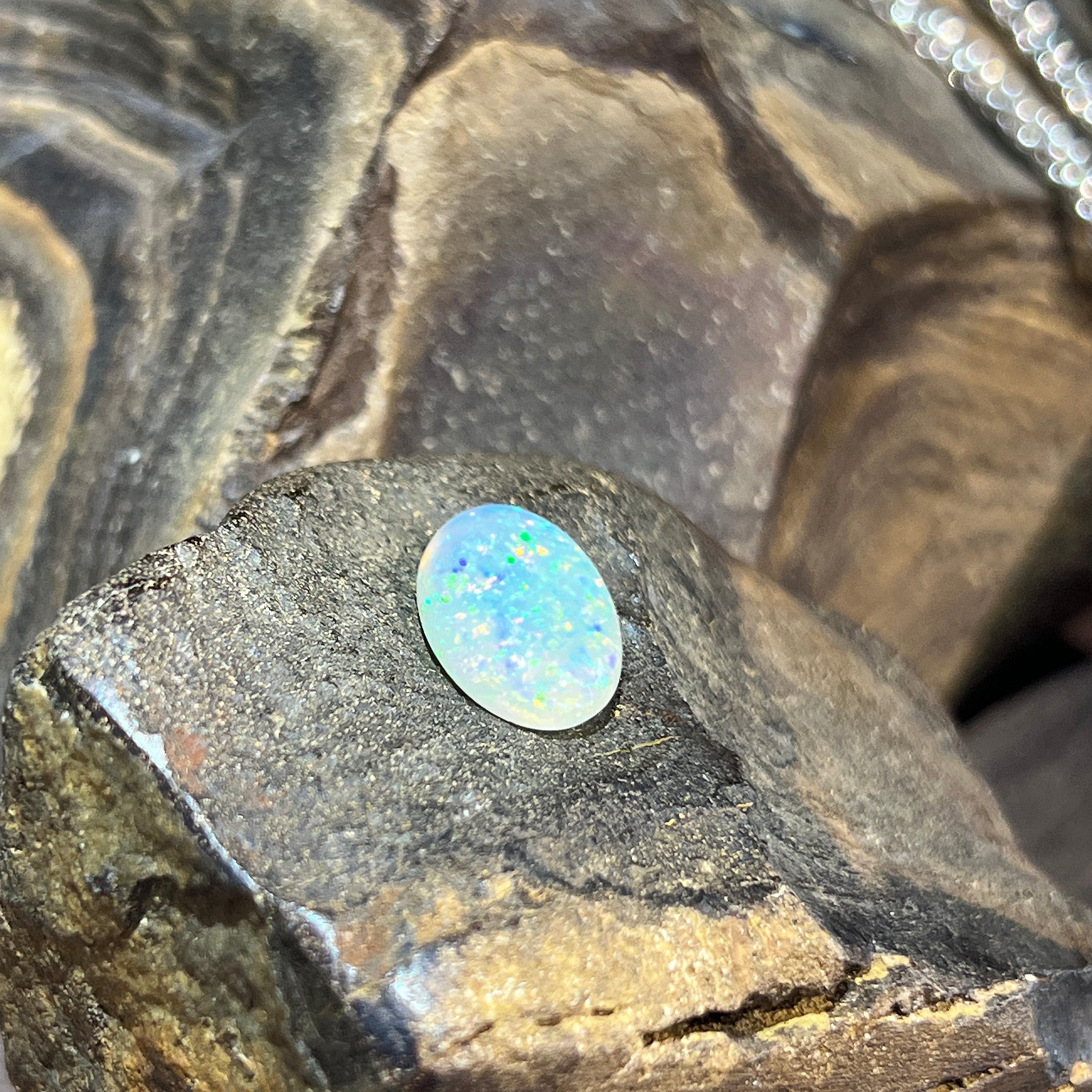 18x11mm crystal opal oval with bright blue-green flashes