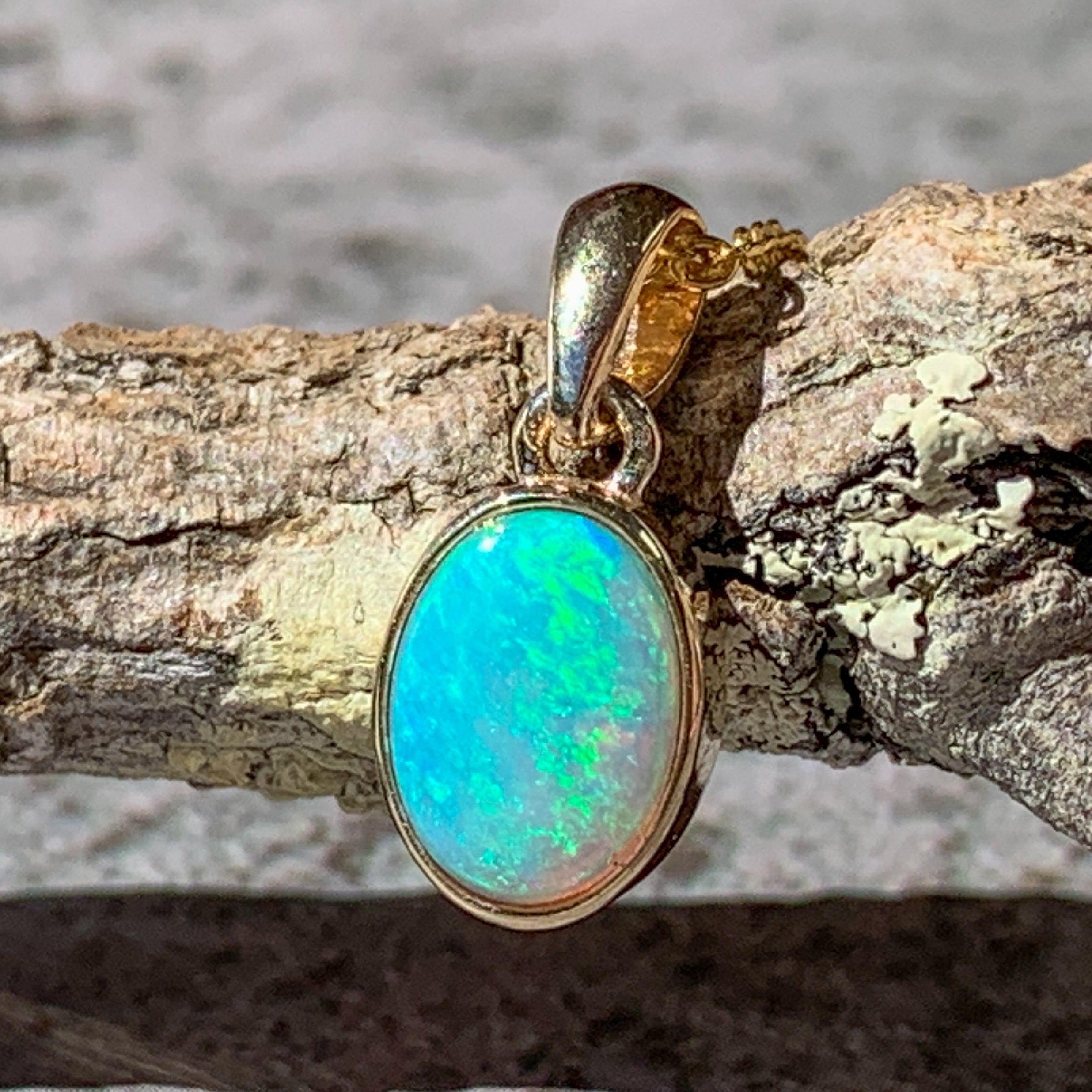9kt Yellow Gold bezel set 8x6mm Light Opal pendant - Masterpiece Jewellery Opal & Gems Sydney Australia | Online Shop