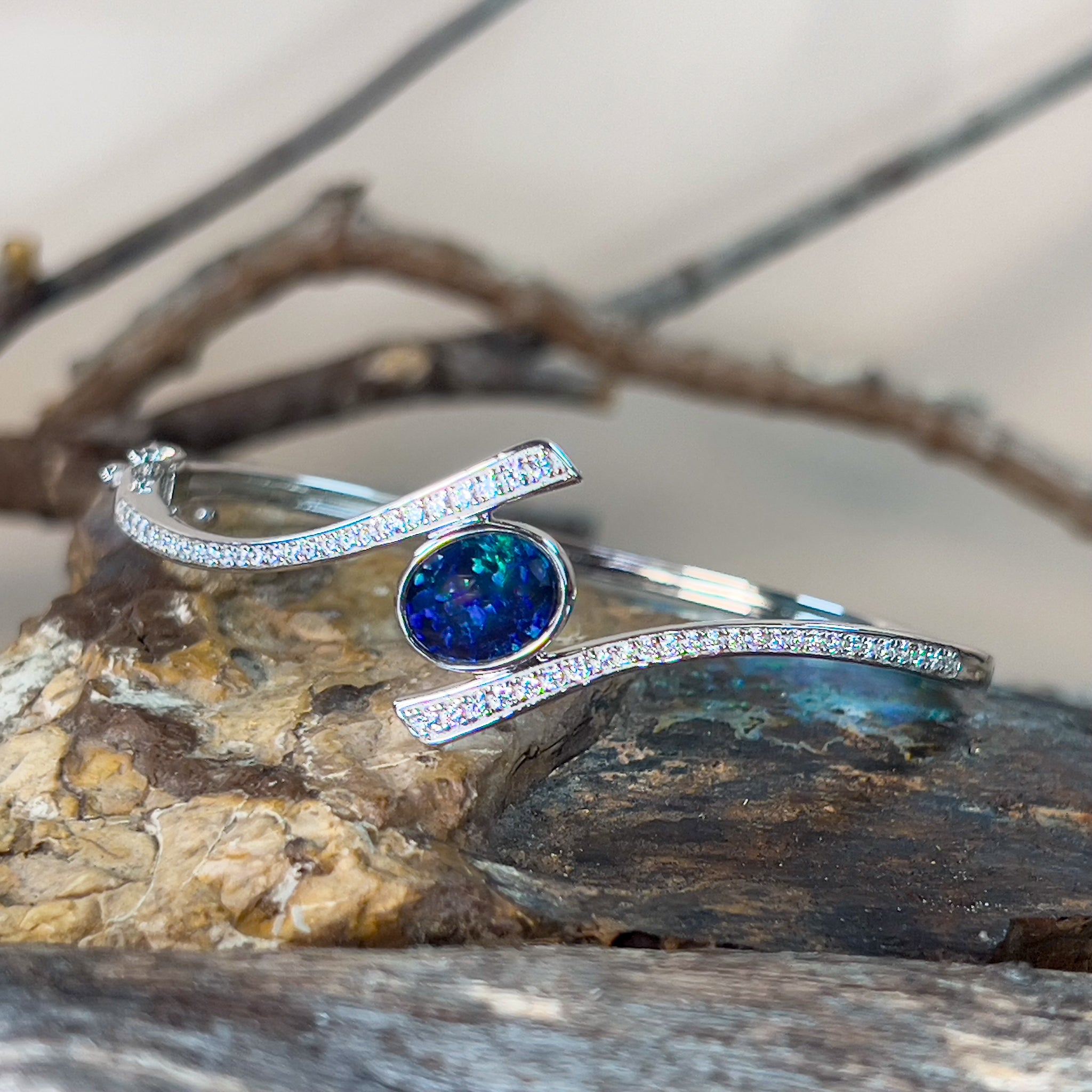 Sterling Silver cross over snap bangle with Opal triplet and cz - Masterpiece Jewellery Opal & Gems Sydney Australia | Online Shop