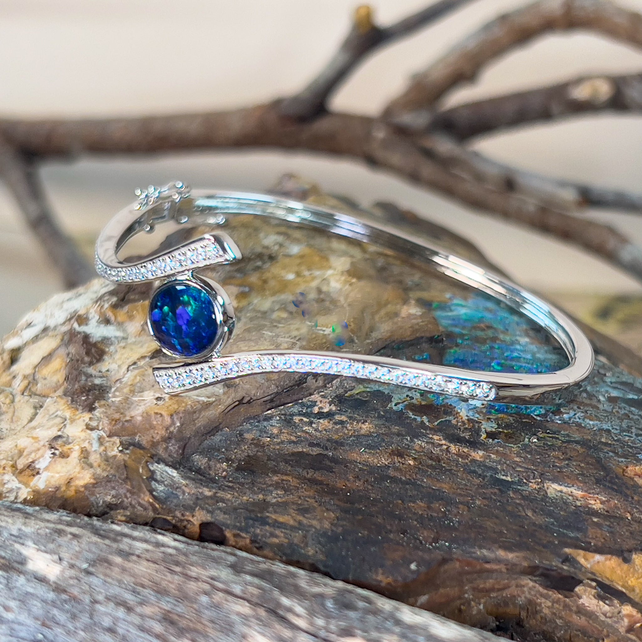 Sterling Silver cross over snap bangle with Opal triplet and cz - Masterpiece Jewellery Opal & Gems Sydney Australia | Online Shop