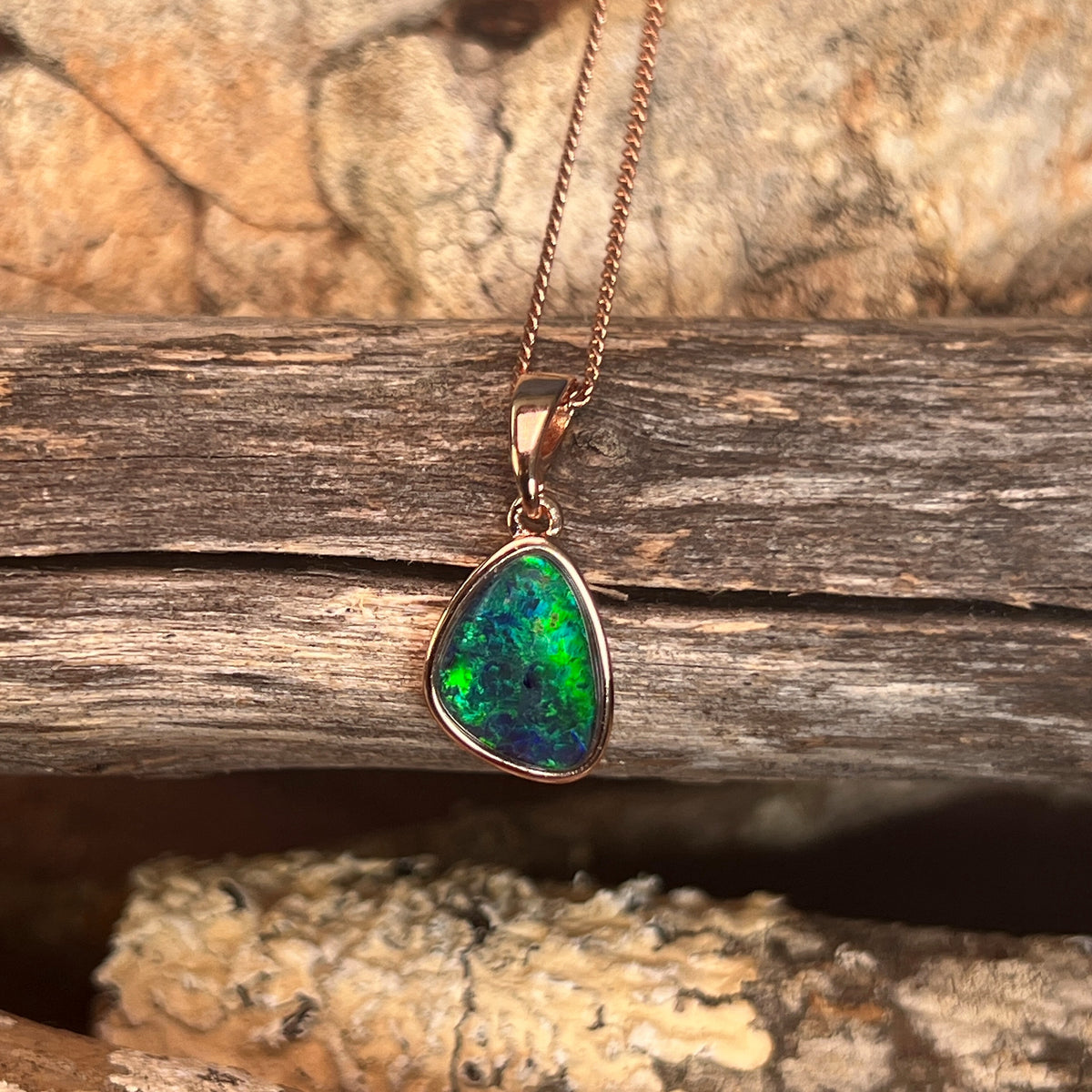 12 x 8mm Australian opal triplet pendant in rose gold-plated silver, red, green and blue