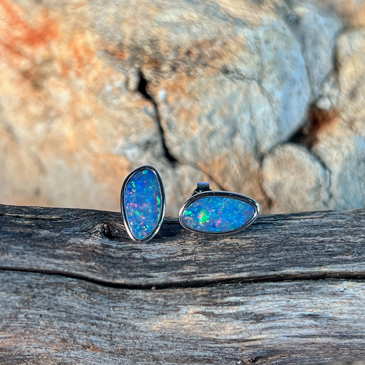 freeform Australian opal doublet earrings in sterling silver, red, blue, yellow and green play-of-colour