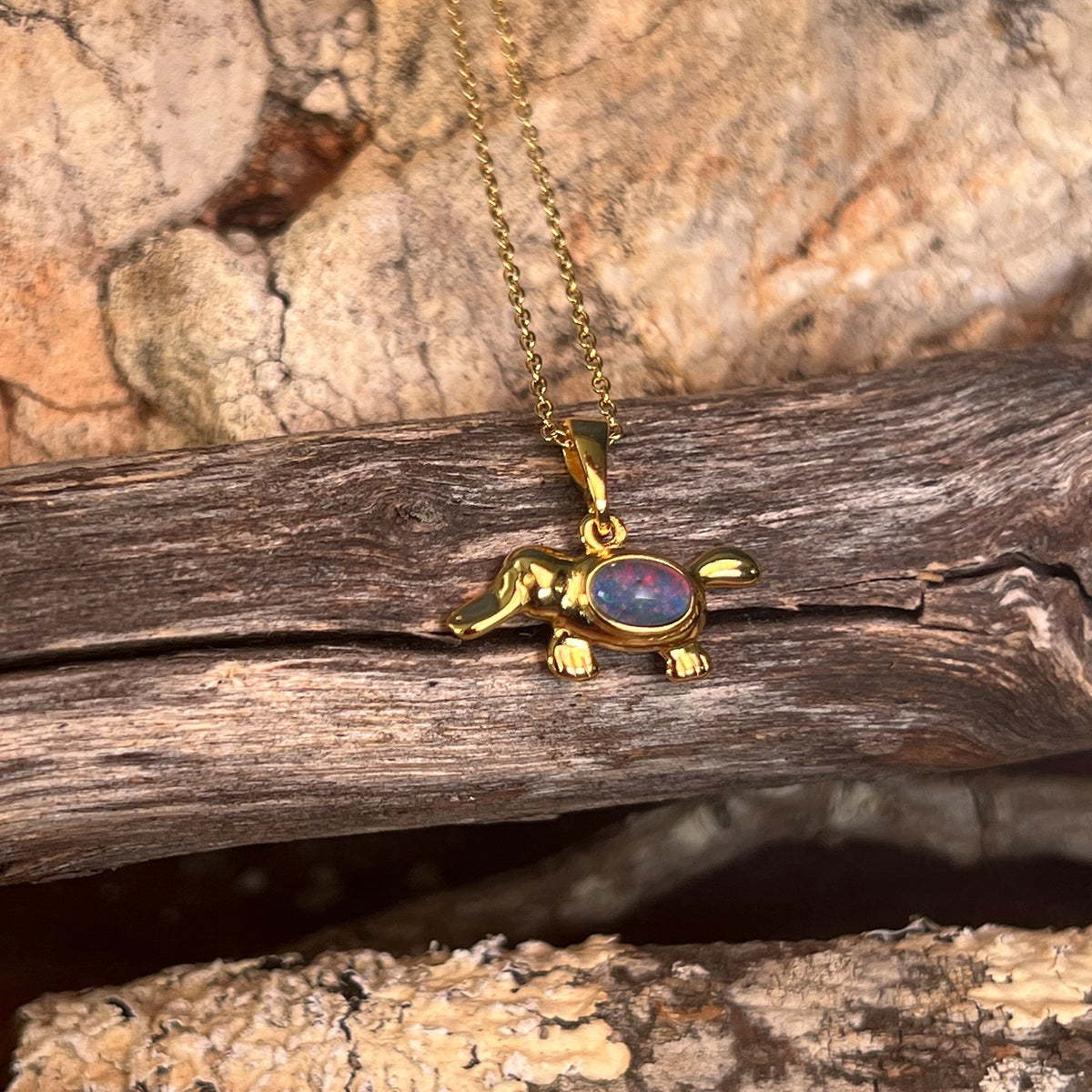 yellow gold-plated silver Australian opal triplet pendant with a 6 x 4mm oval stone