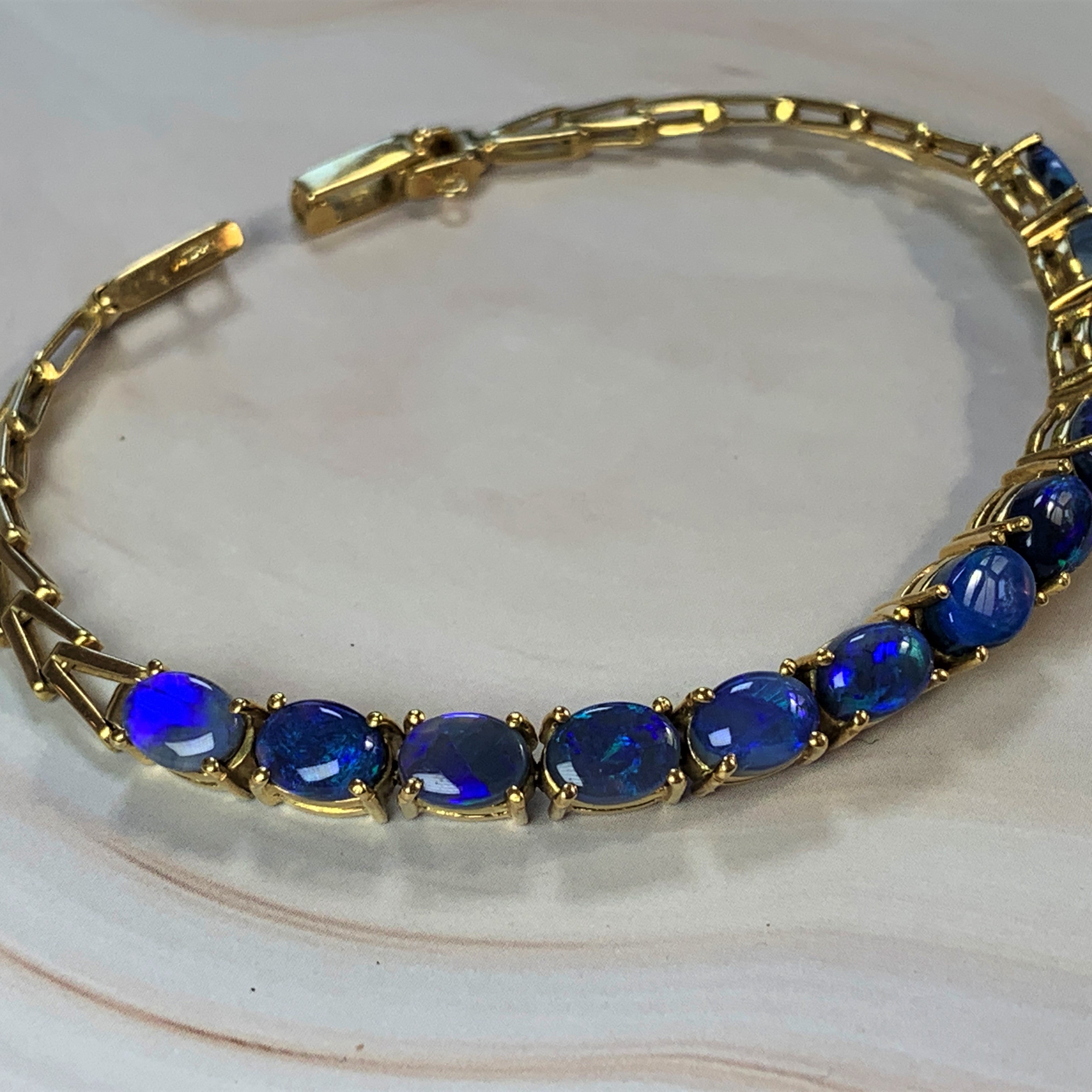 18kt Yellow Gold Black Opal 4.2ct bracelet - Masterpiece Jewellery Opal & Gems Sydney Australia | Online Shop