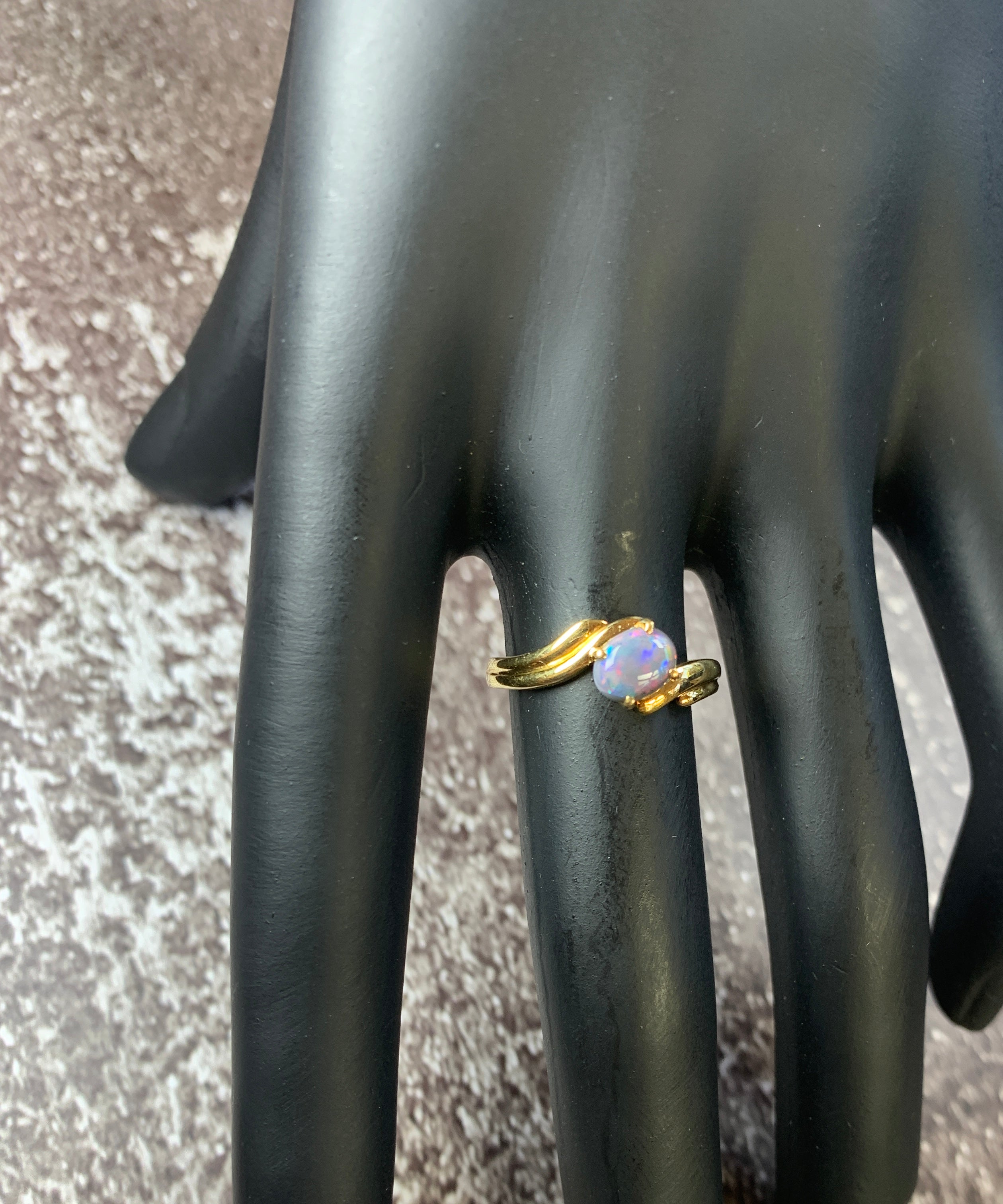 18kt Yellow Gold Black Opal 0.63ct cross over split shank ring - Masterpiece Jewellery Opal & Gems Sydney Australia | Online Shop