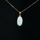 18kt yellow gold Australian white opal pendant, 2.3ct oval solid white opal in a claw setting