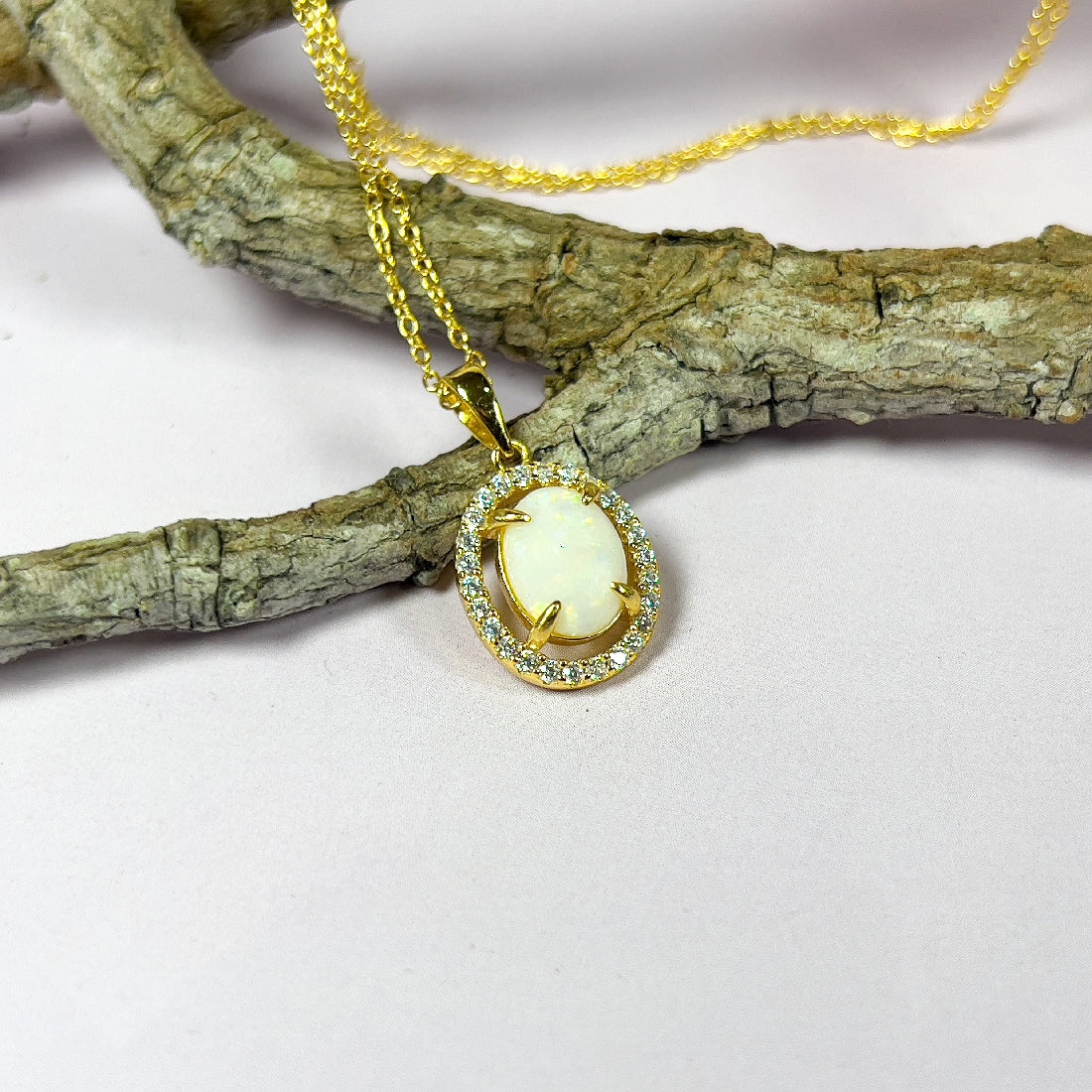 Gold plated Sterling Silver 9x7mm White Opal halo pendant - Masterpiece Jewellery Opal & Gems Sydney Australia | Online Shop