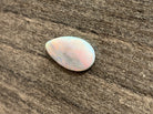 Pearshape Black Opal with red colour 7.08ct