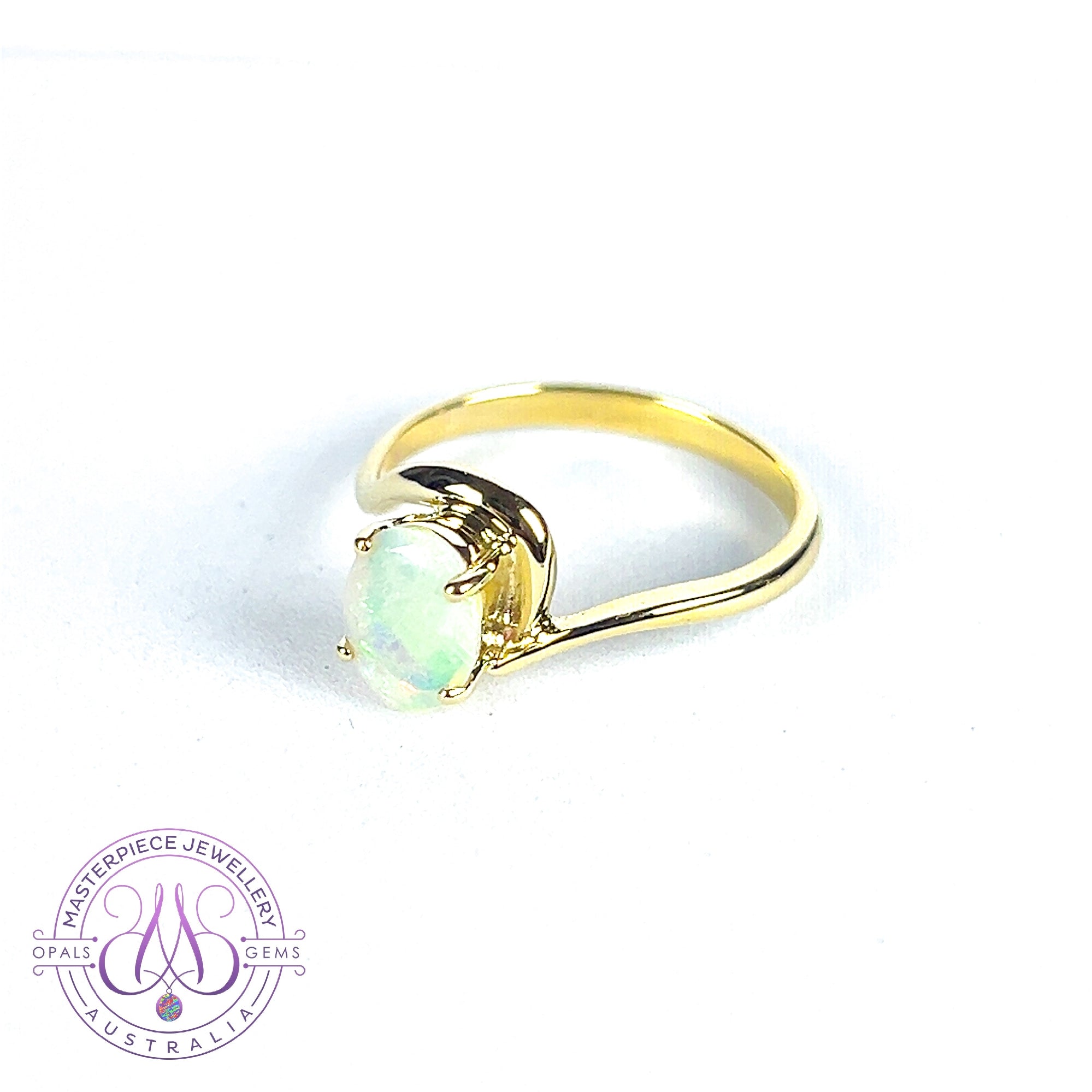 14kt Yellow Gold crossover ring with one 0.55ct Crystal Opal