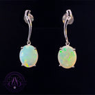 Sterling Silver dangling Crystal Opal 10x8mm curved bar earrings