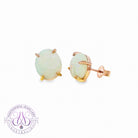 18kt Rose Gold Light Opal 6.2ct 4 claw stud earrings