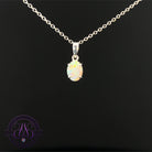 9kt White Gold Black Opal 0.7ct pendant classic