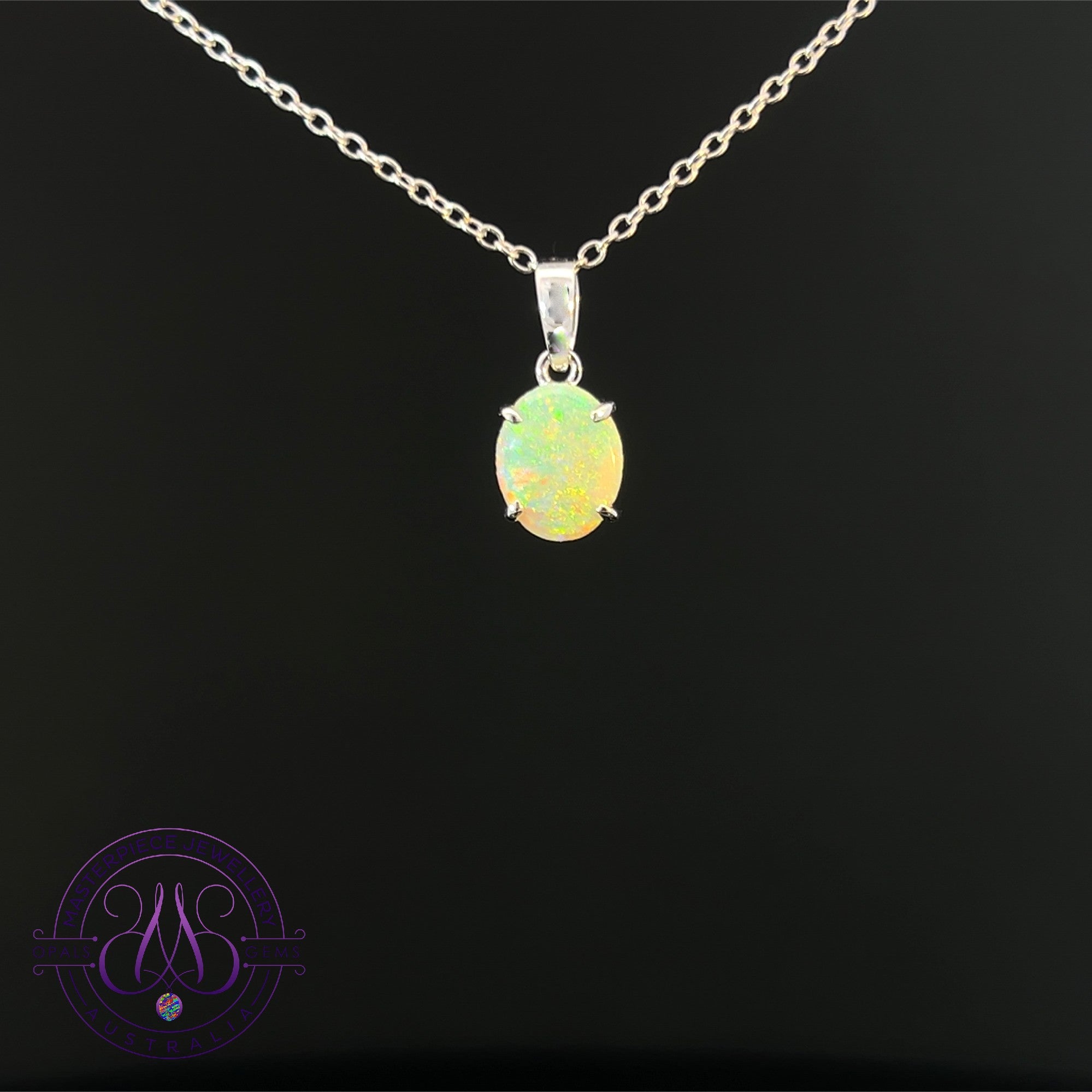 9kt White gold Black opal 0.6ct claw set pendant