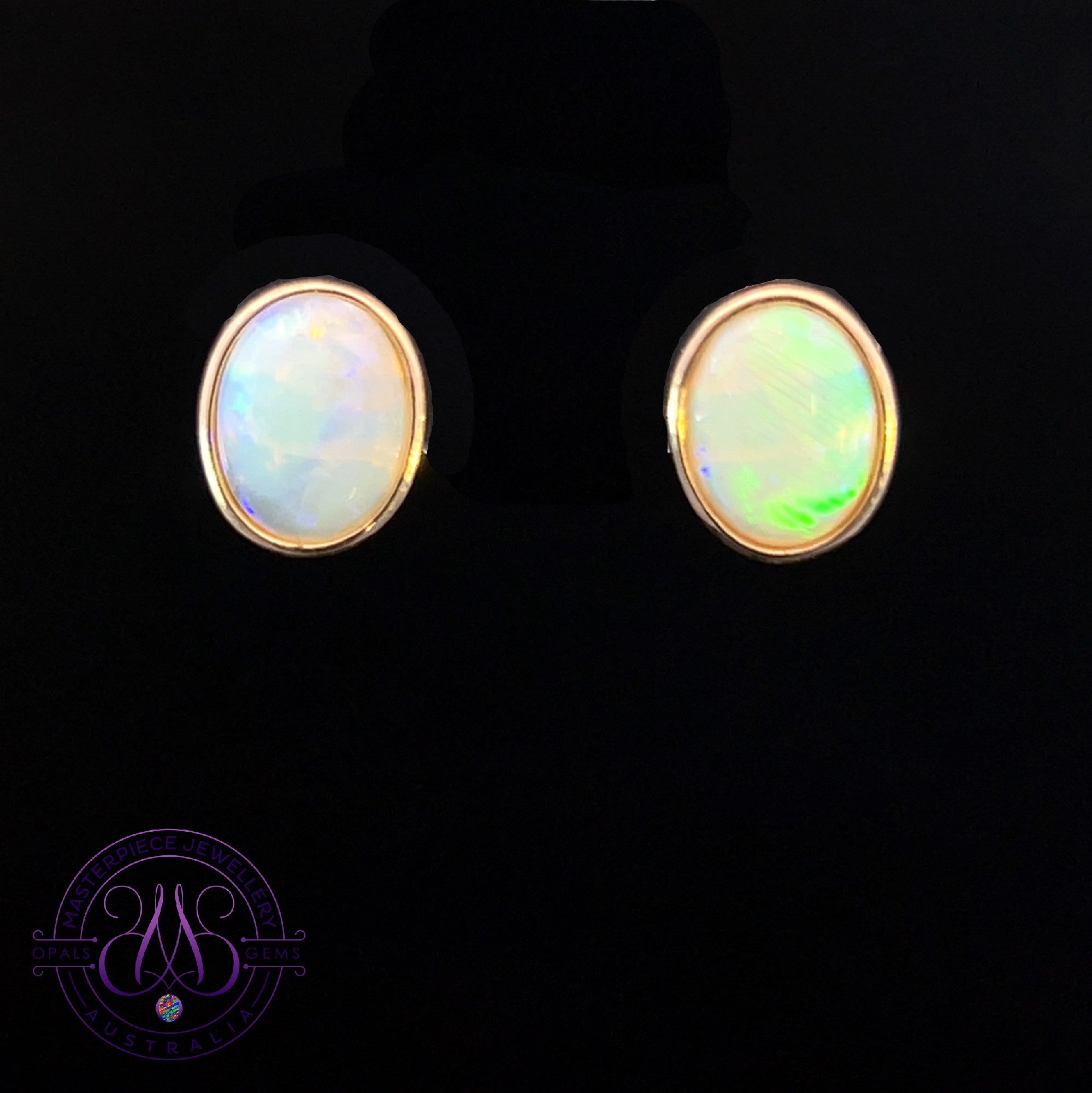9kt Yellow Gold Oval  10x8mm Light Opal bezel set 2ct earrings