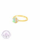 9KT Yellow Gold pear shape 8x5mm Opal and diamond ring
