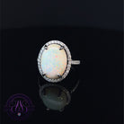 Platinum Halo White Opal 5.36ct and diamond cluster ring