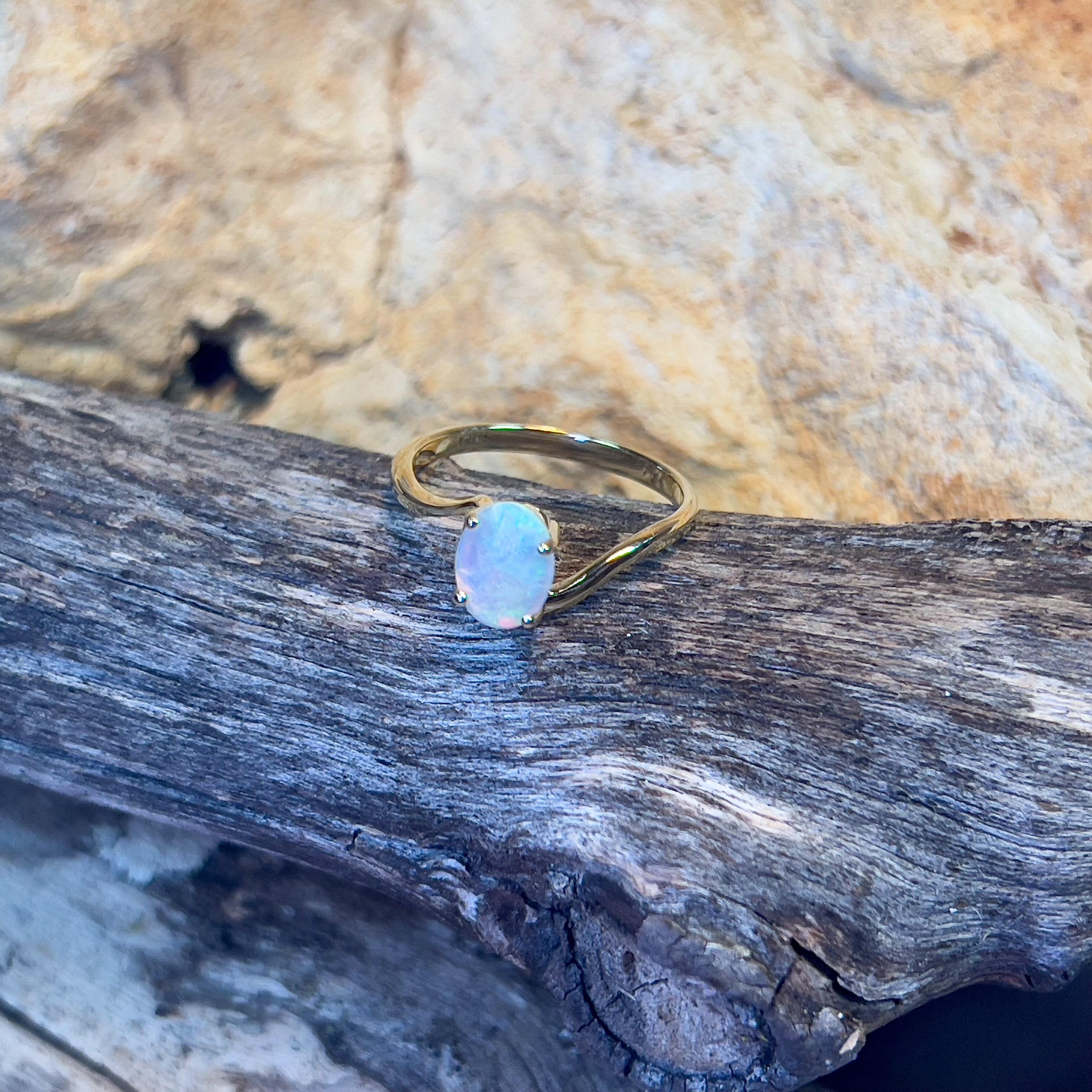 14kt Yellow Gold crossover ring with one 0.55ct Crystal Opal - Masterpiece Jewellery Opal & Gems Sydney Australia | Online Shop