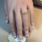 14kt Yellow Gold Black Opal 0.5ct bezel set solitaire ring - Masterpiece Jewellery Opal & Gems Sydney Australia | Online Shop