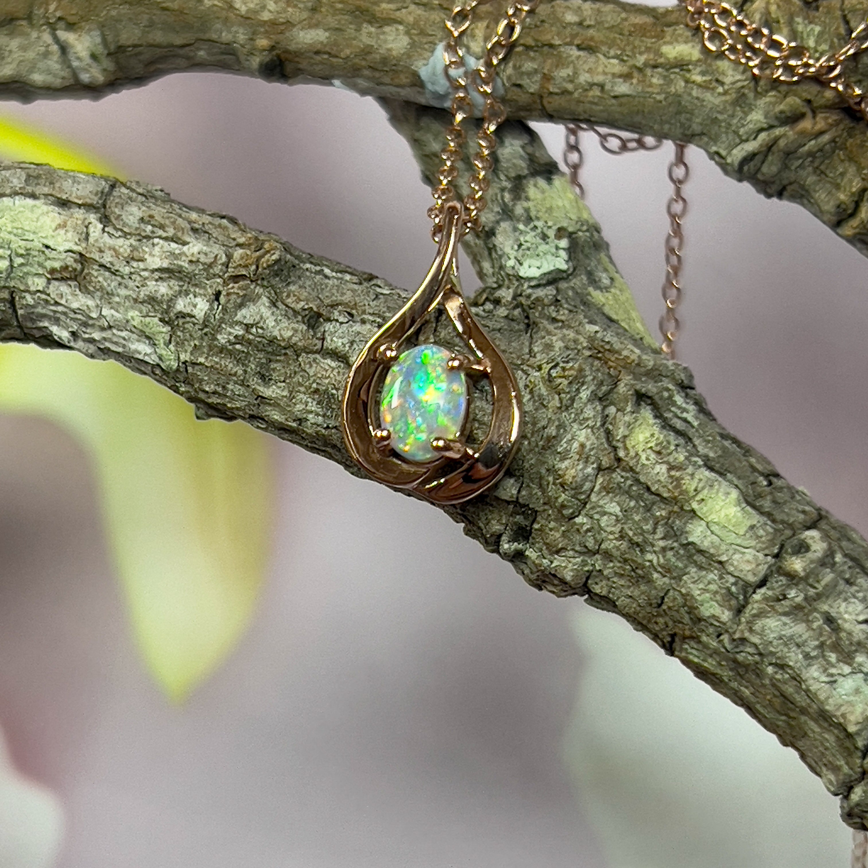 14kt Rose Gold swirl pendant with one Black Opal 0.33ct - Masterpiece Jewellery Opal & Gems Sydney Australia | Online Shop