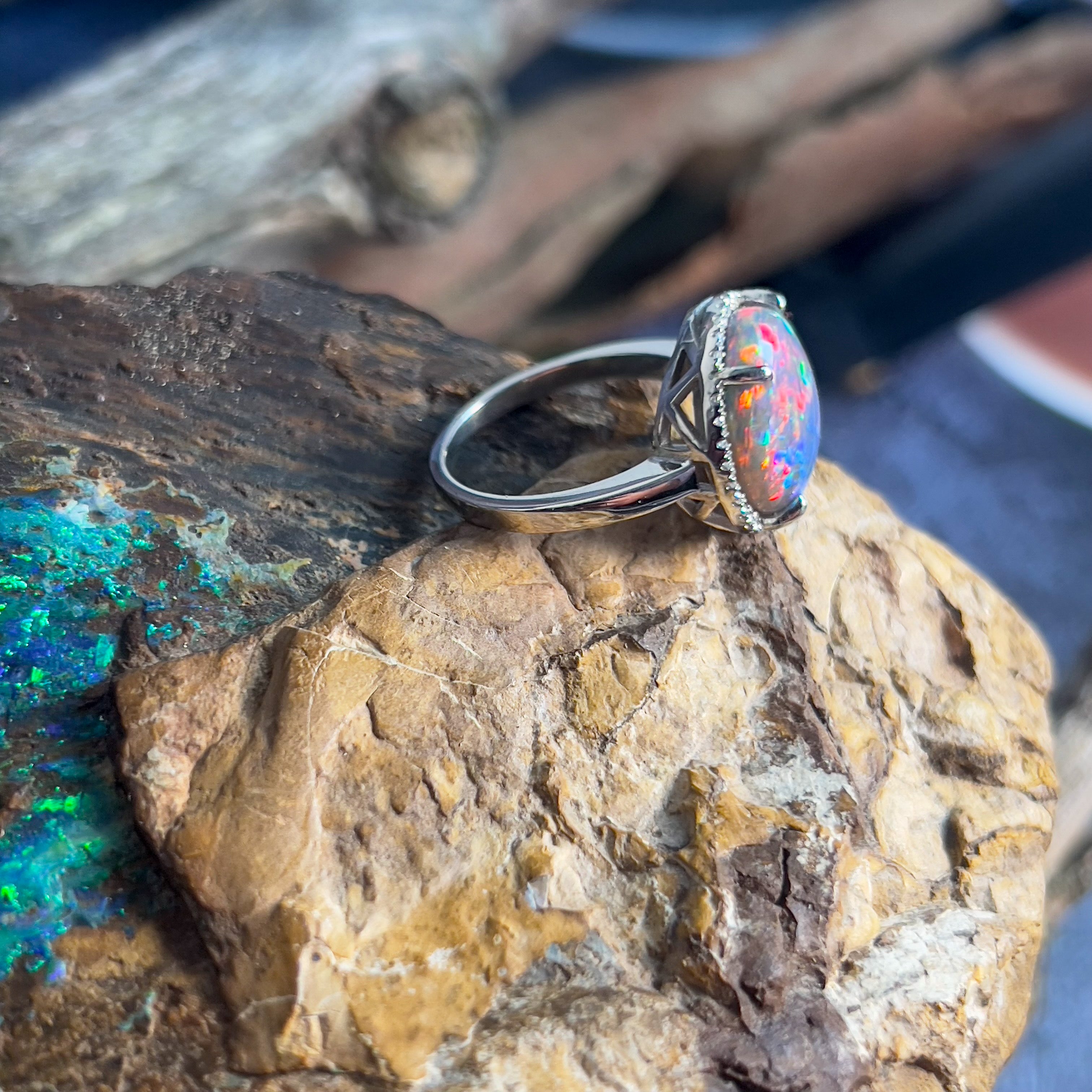 Platinum Halo ring with Black Opal 6.2ct Red flashes and Diamonds - Masterpiece Jewellery Opal & Gems Sydney Australia | Online Shop