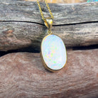 18kt Yellow Gold classic Oval White Opal 6.98ct bezel set pendant - Masterpiece Jewellery Opal & Gems Sydney Australia | Online Shop