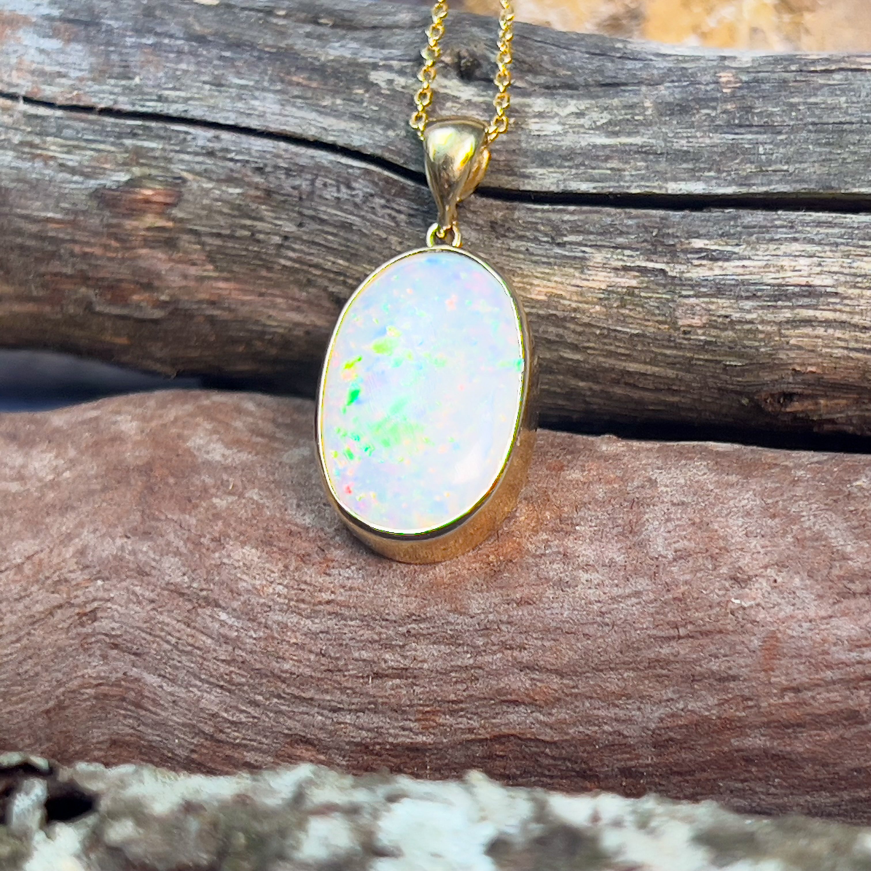 18kt Yellow Gold classic Oval White Opal 6.98ct bezel set pendant - Masterpiece Jewellery Opal & Gems Sydney Australia | Online Shop