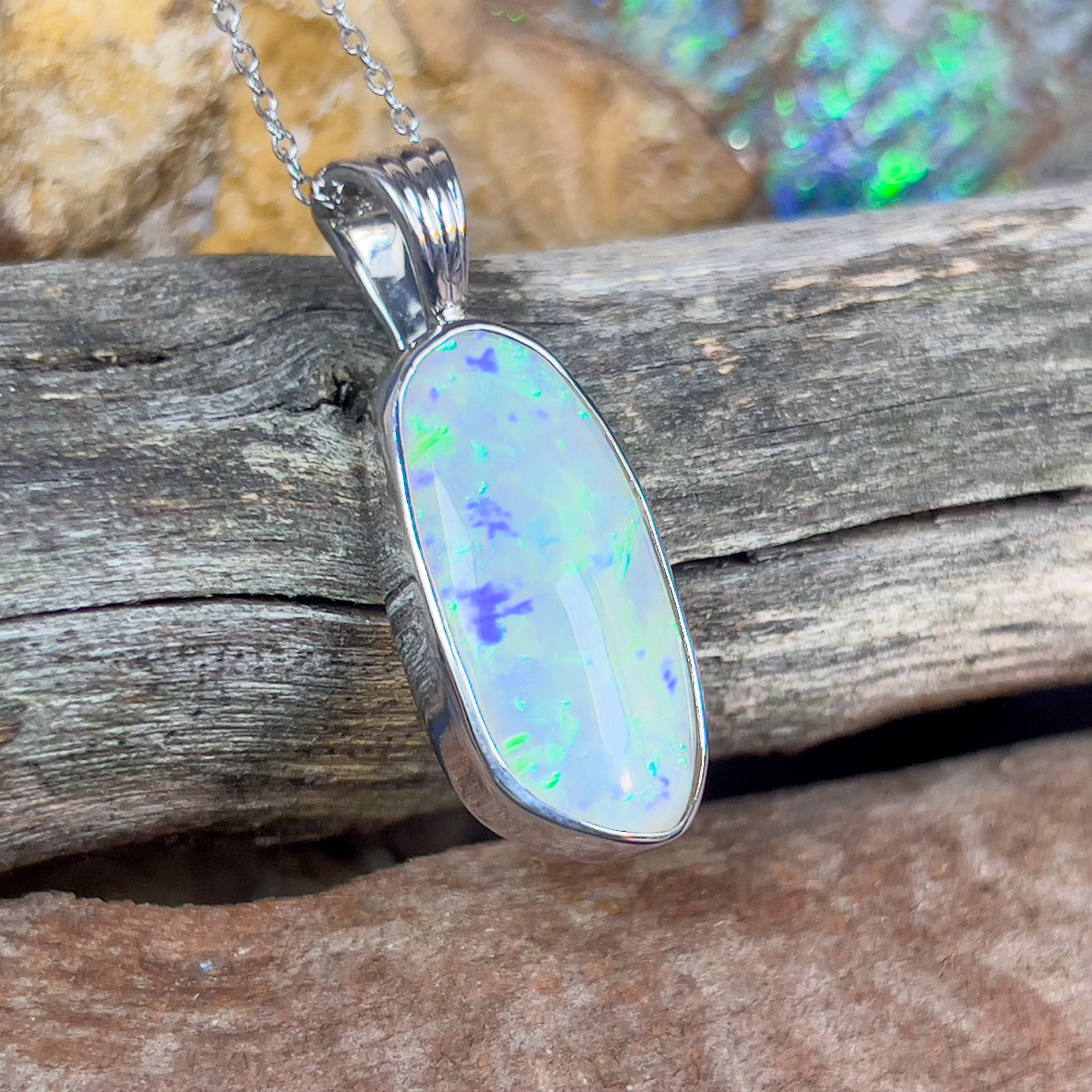 18kt White Gold classic bezel set Black Opal 5.4ct pendant - Masterpiece Jewellery Opal & Gems Sydney Australia | Online Shop