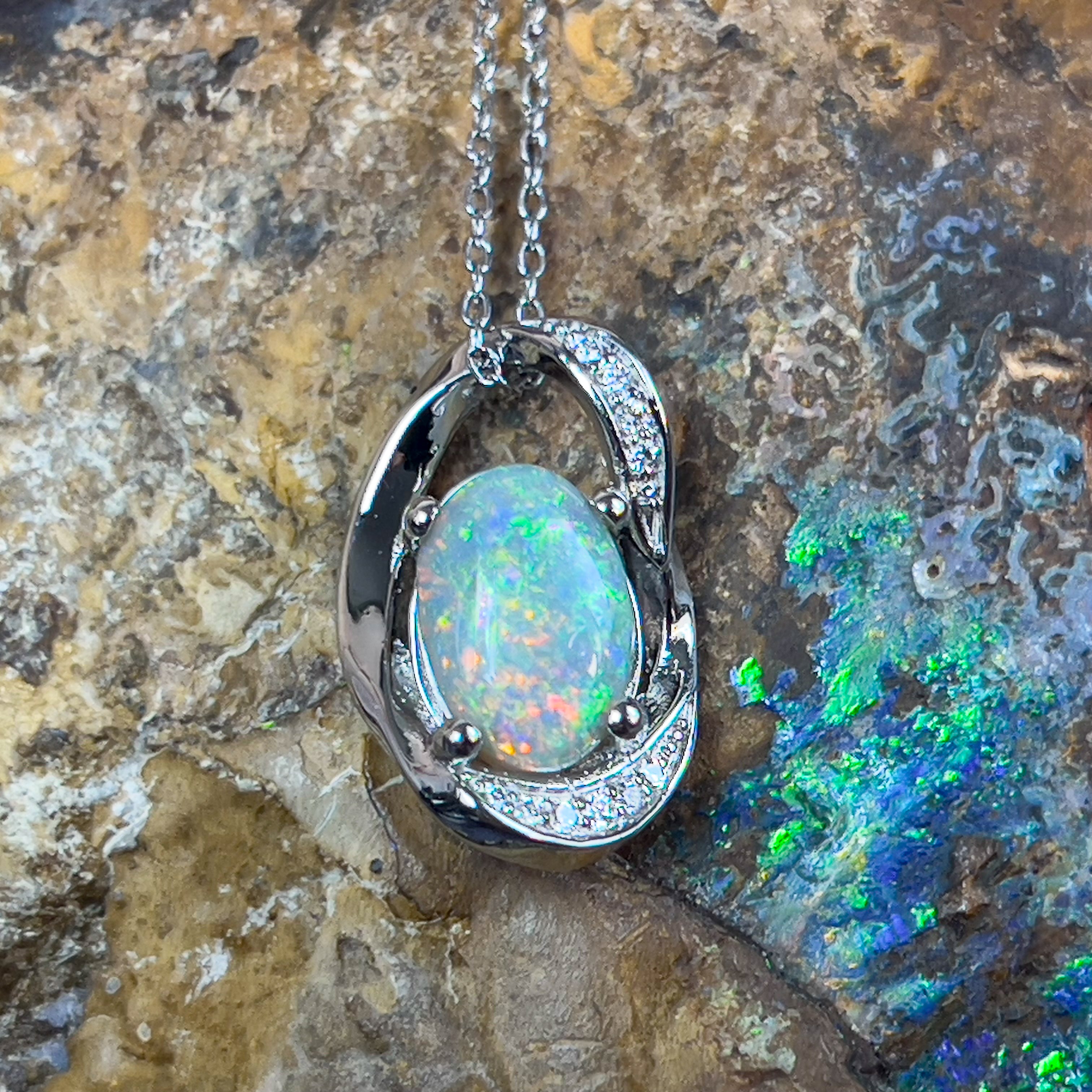 Platinum Pendant with 1.77ct Black Opal and 10 Diamonds - Masterpiece Jewellery Opal & Gems Sydney Australia | Online Shop