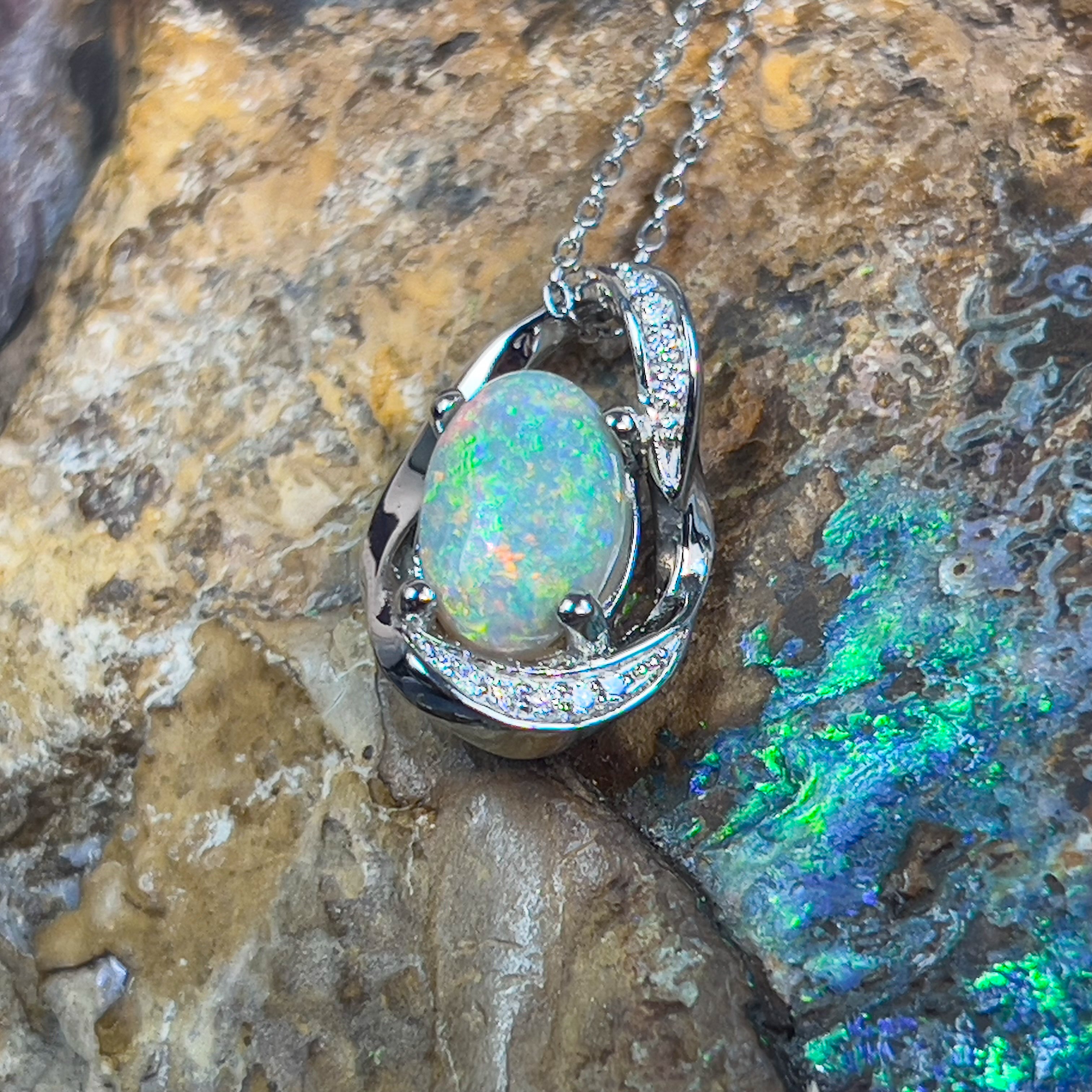 Platinum Pendant with 1.77ct Black Opal and 10 Diamonds - Masterpiece Jewellery Opal & Gems Sydney Australia | Online Shop