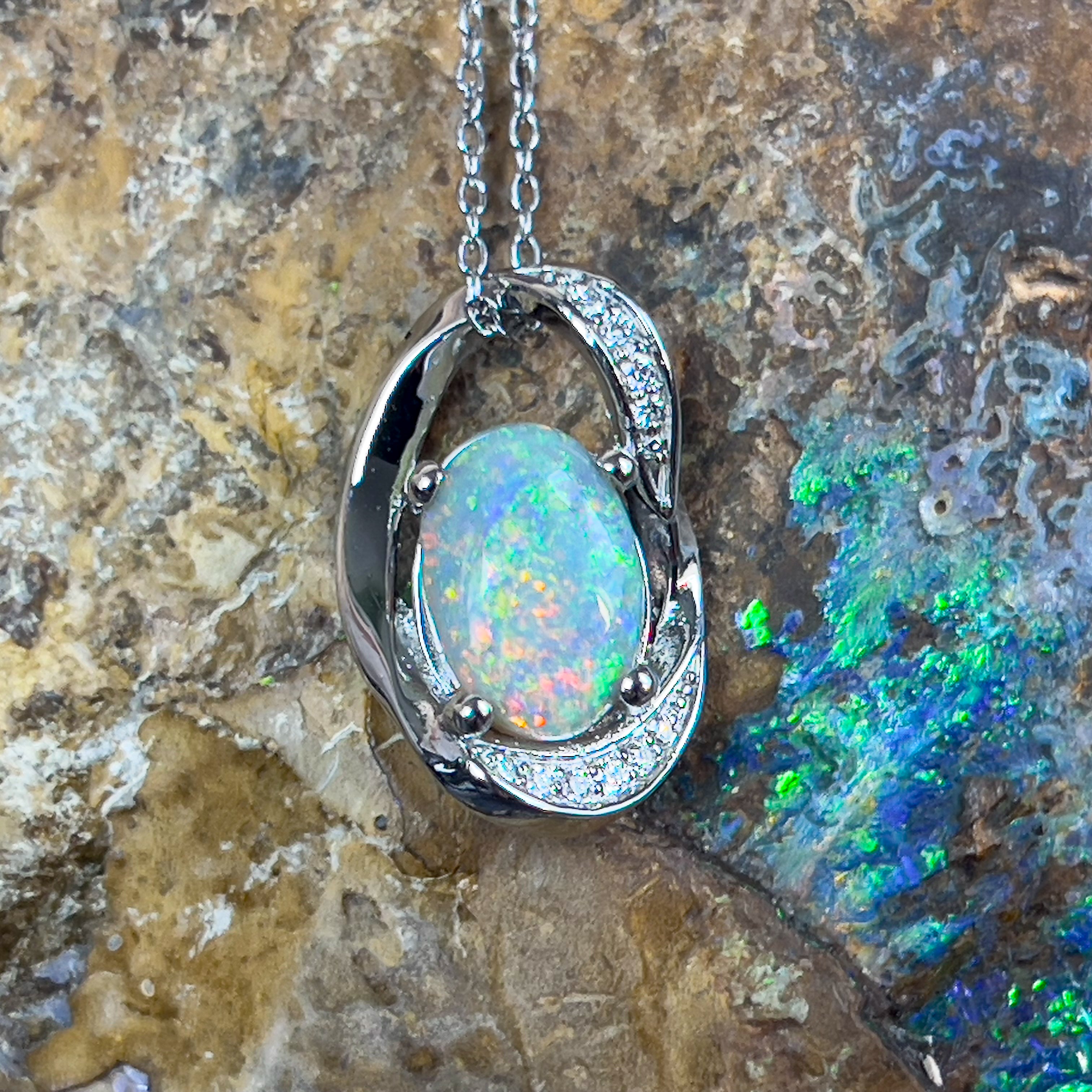 Platinum Pendant with 1.77ct Black Opal and 10 Diamonds - Masterpiece Jewellery Opal & Gems Sydney Australia | Online Shop