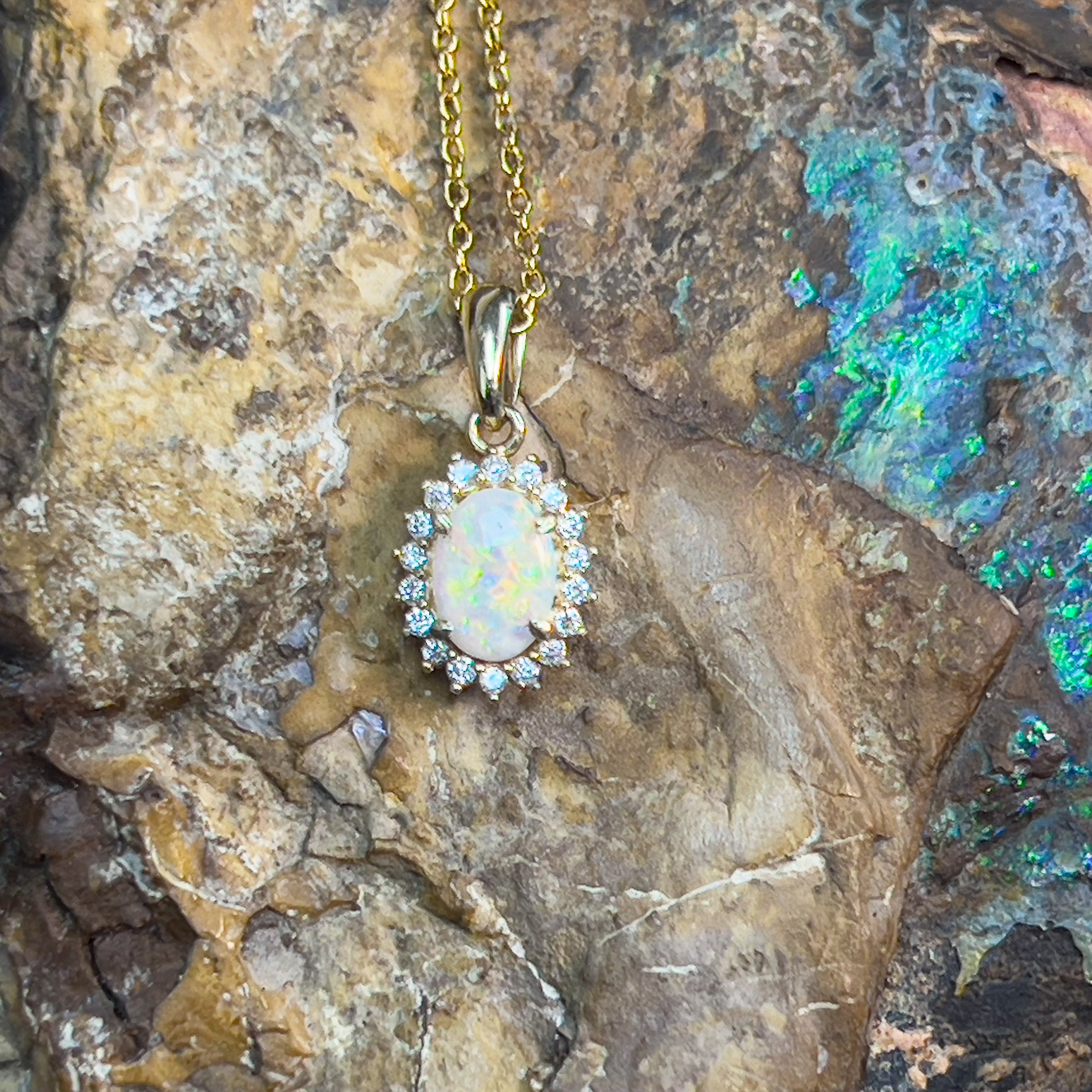 9kt Yellow Gold 7x5mm White Opal and diamond cluster pendant - Masterpiece Jewellery Opal & Gems Sydney Australia | Online Shop