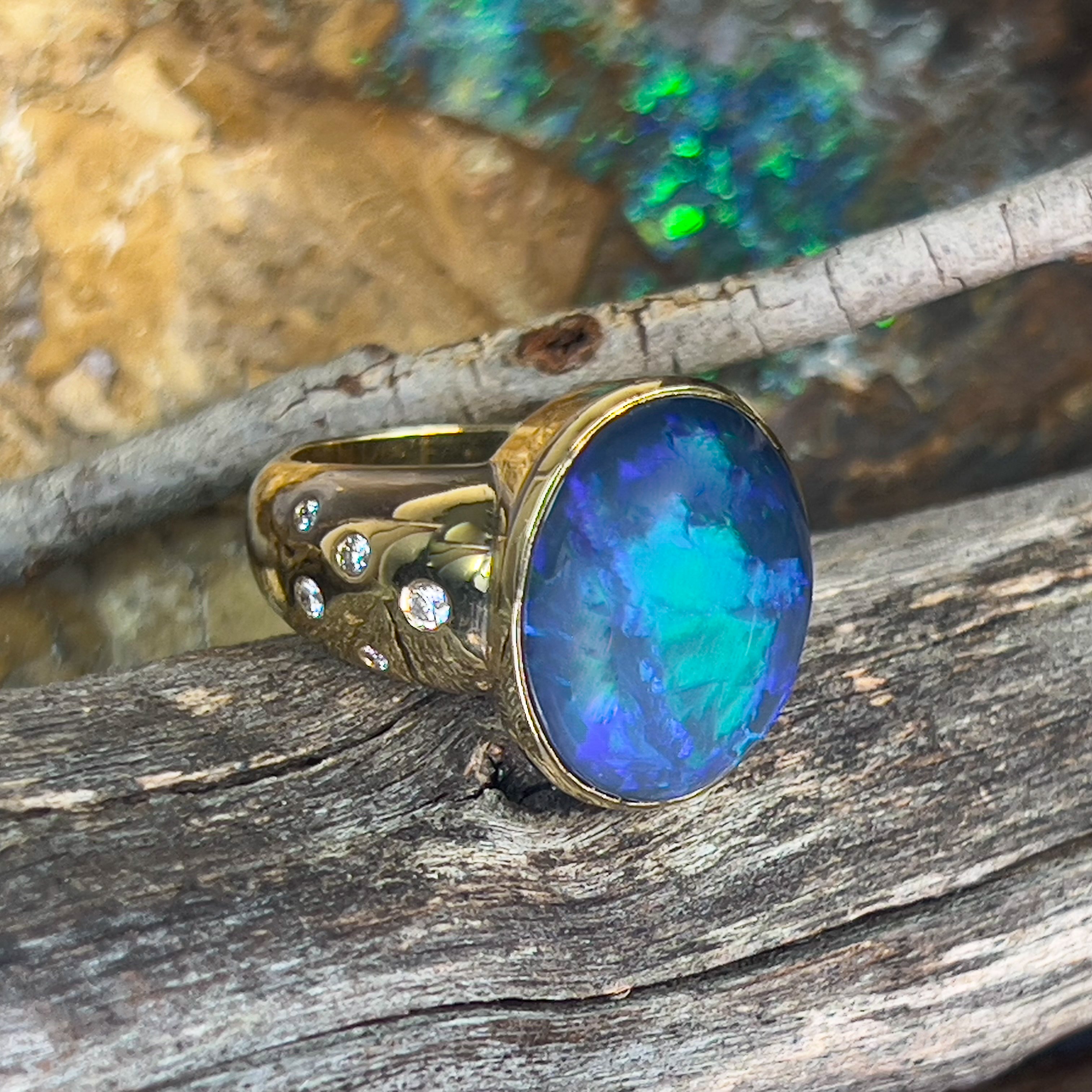 18kt Yellow Gold bezel set band Black Opal 6.05ct and diamonds flush set ring - Masterpiece Jewellery Opal & Gems Sydney Australia | Online Shop