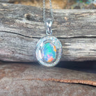 18kt White gold halo Black Opal 1.92ct Red flash pendant with diamonds pendant - Masterpiece Jewellery Opal & Gems Sydney Australia | Online Shop