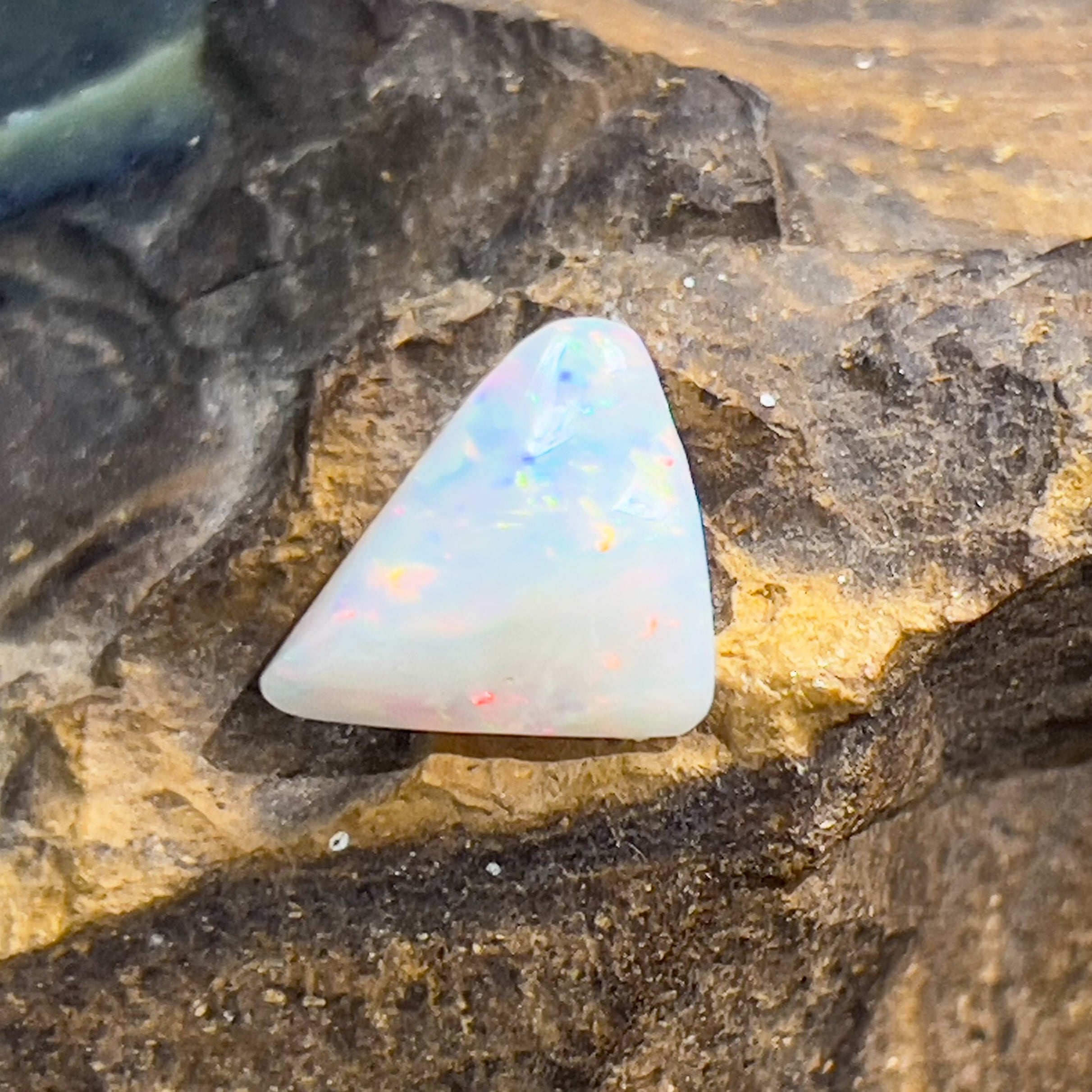 Triangle shape White Opal Red Green blue 3.3ct - Masterpiece Jewellery Opal & Gems Sydney Australia | Online Shop