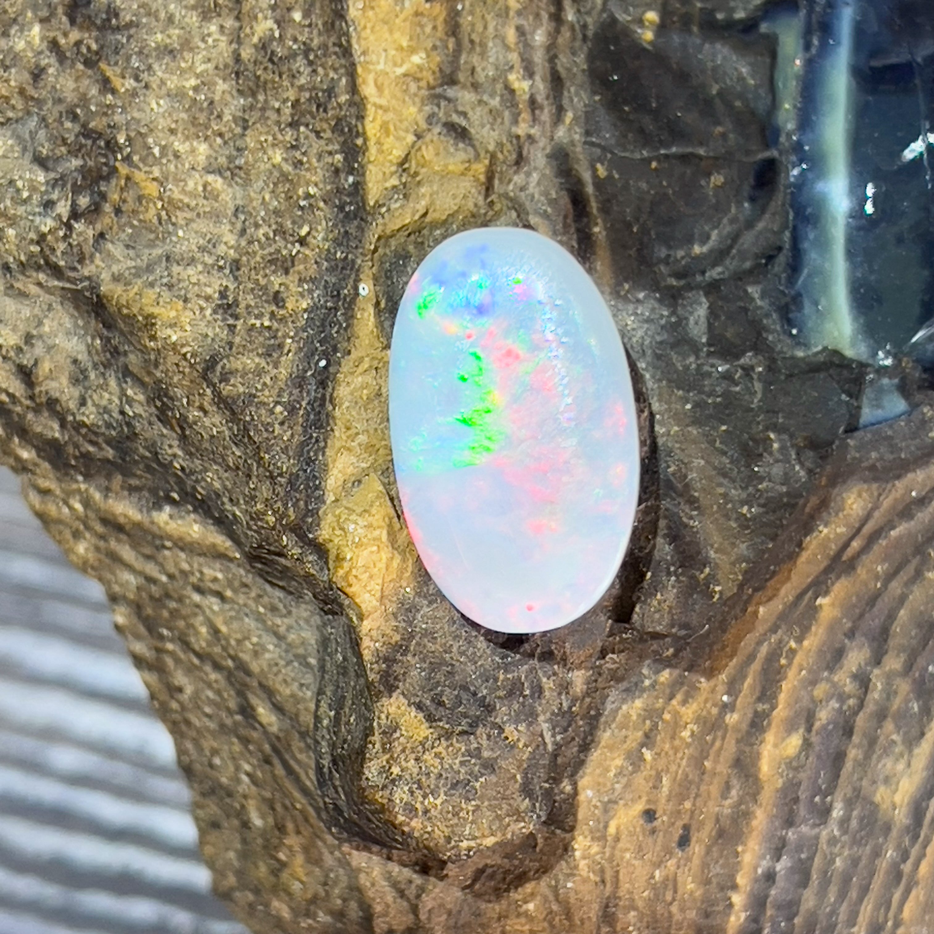 Dark Opal 6.35ct Red flash Oval shape - Masterpiece Jewellery Opal & Gems Sydney Australia | Online Shop