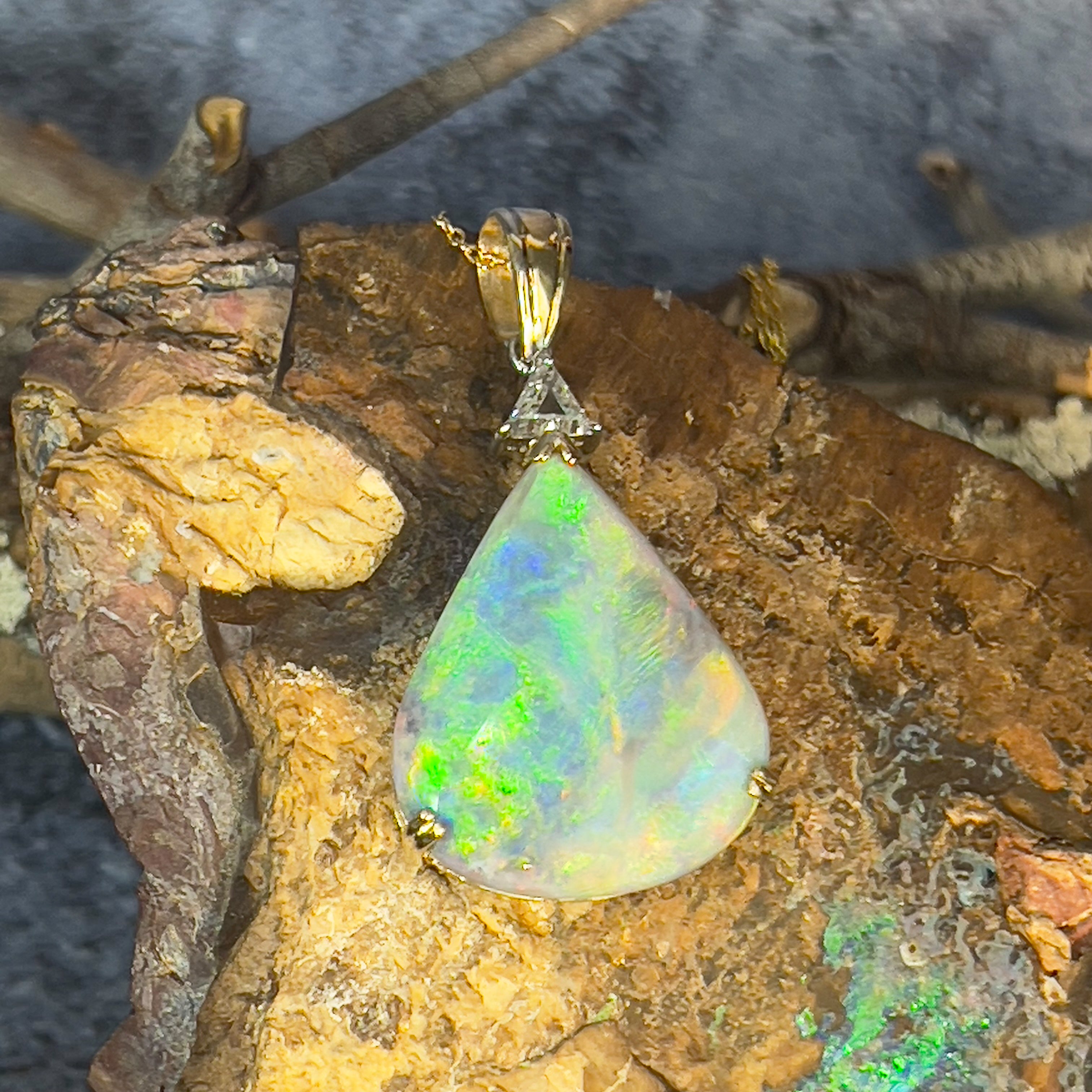 18kt Yellow Gold Pear shape Black Opal 20.05ct and Trillion cut diamond pendant - Masterpiece Jewellery Opal & Gems Sydney Australia | Online Shop