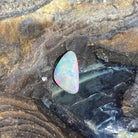 Solid Australian crystal opal 1.36ct, triangular 13x8mm, green, red and blue play-of-colour, loose stone on rock