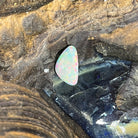 Loose solid crystal opal 1.36ct, triangular, green, red and blue play-of-colour, ready for a custom setting, on rock