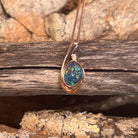 freeform Australian opal doublet pendant in rose gold-plated silver, green, red and blue play-of-colour