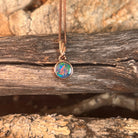 round Australian opal doublet pendant in rose gold-plated silver, green, red, blue and yellow play-of-colour