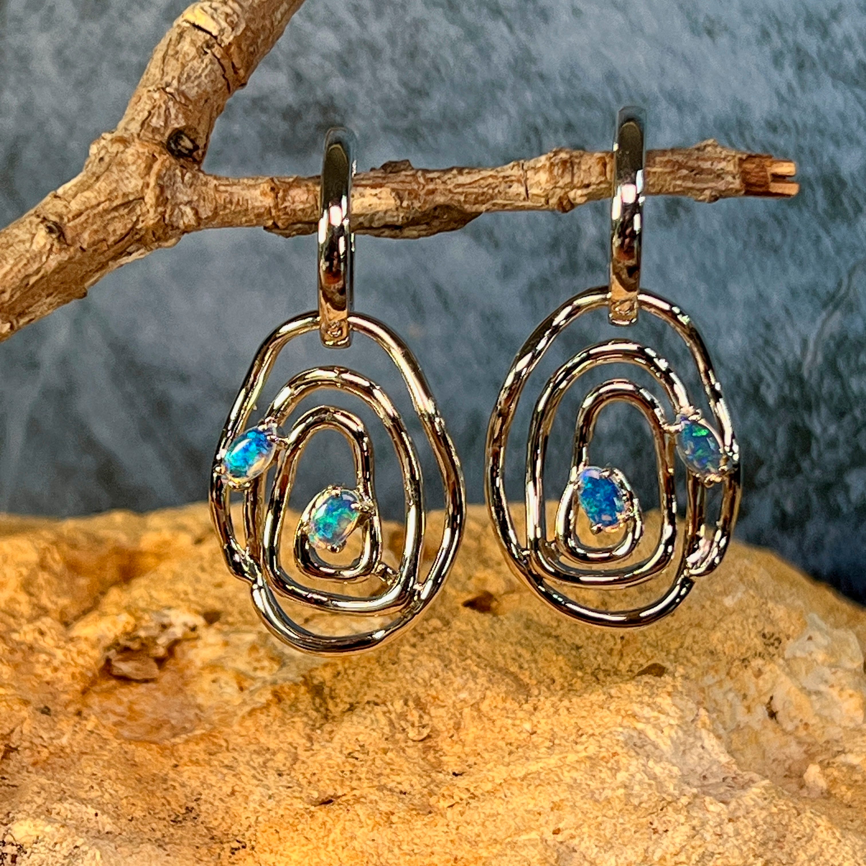 Sterling silver circle earrings set with Australian opal