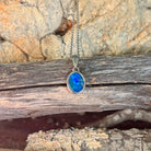 Australian opal doublet pendant, sterling silver, 9.5 x 7mm stone showing blue, green and red