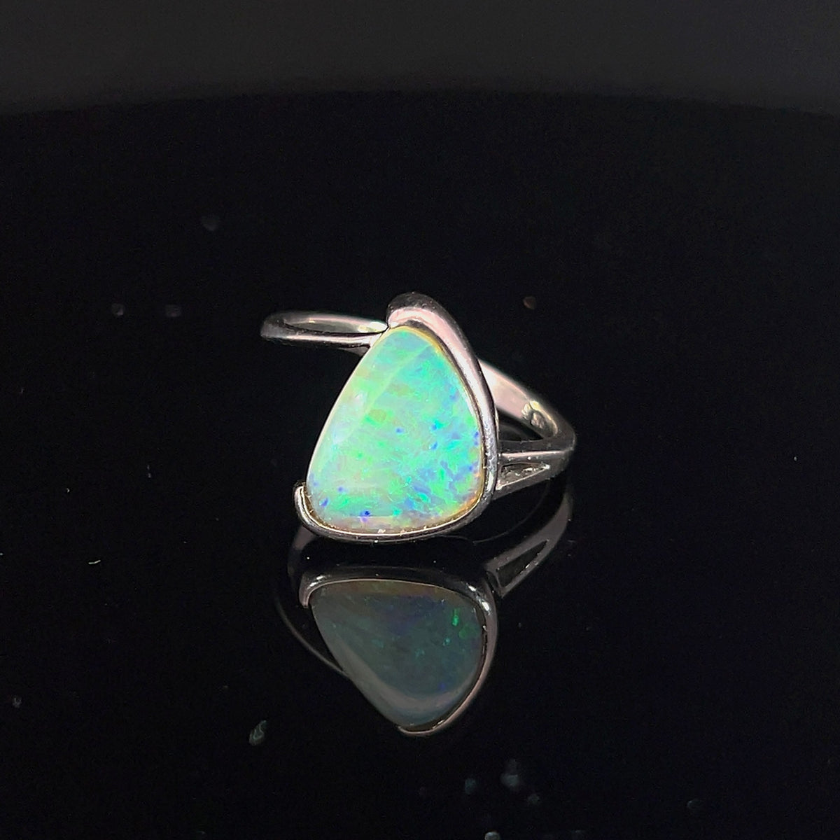 Sterling silver cross over ring, half bezel set solid Australian crystal opal, triangular 13x10mm 1.8ct, green and blue