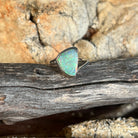 Triangular crystal opal ring in sterling silver, 1.8ct solid opal, green and blue play-of-colour, on weathered timber